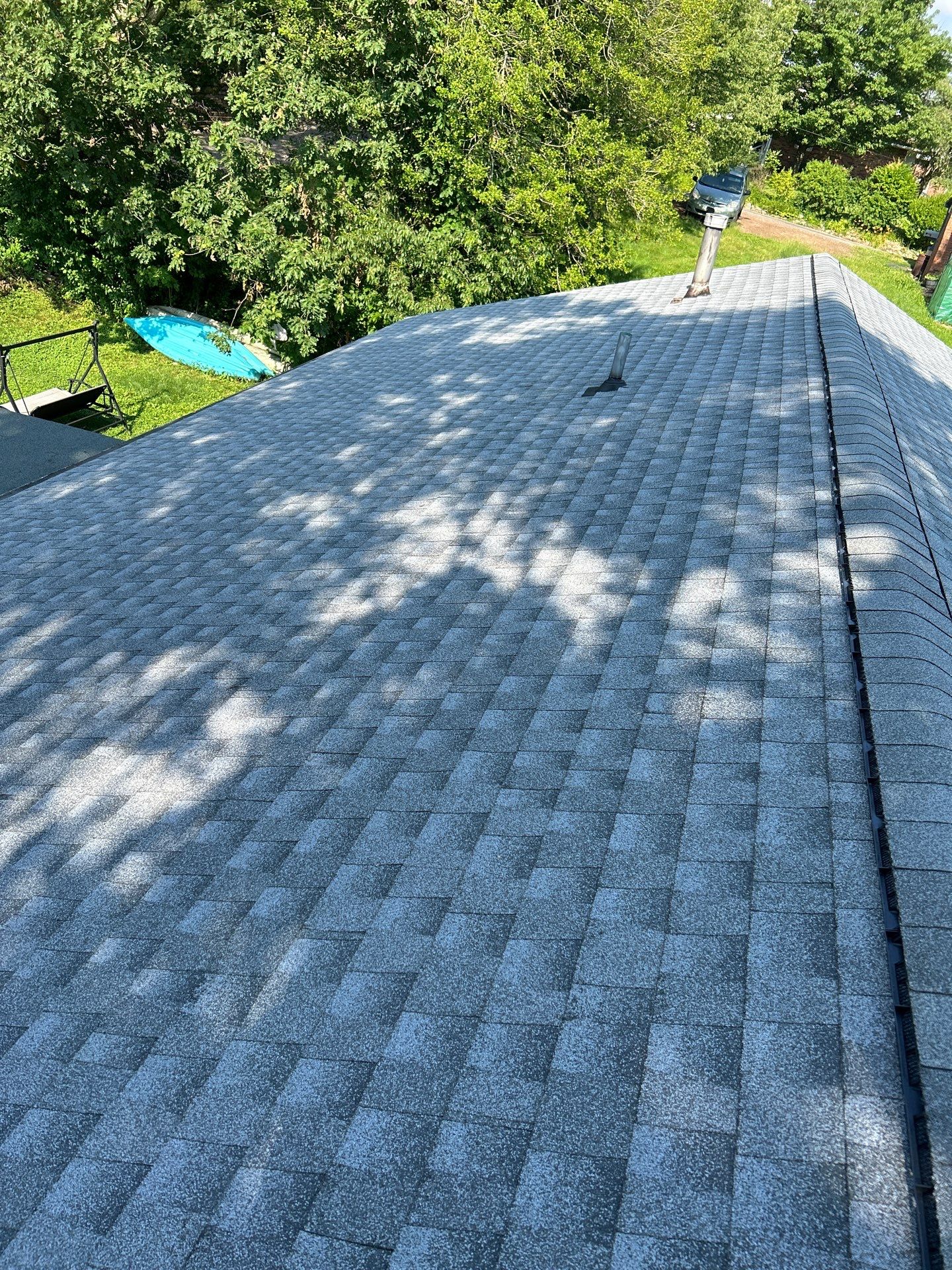 Residential Roofing Installation using GAF Timberline HDZ Oyster Grey by Rainstoppers Roofing