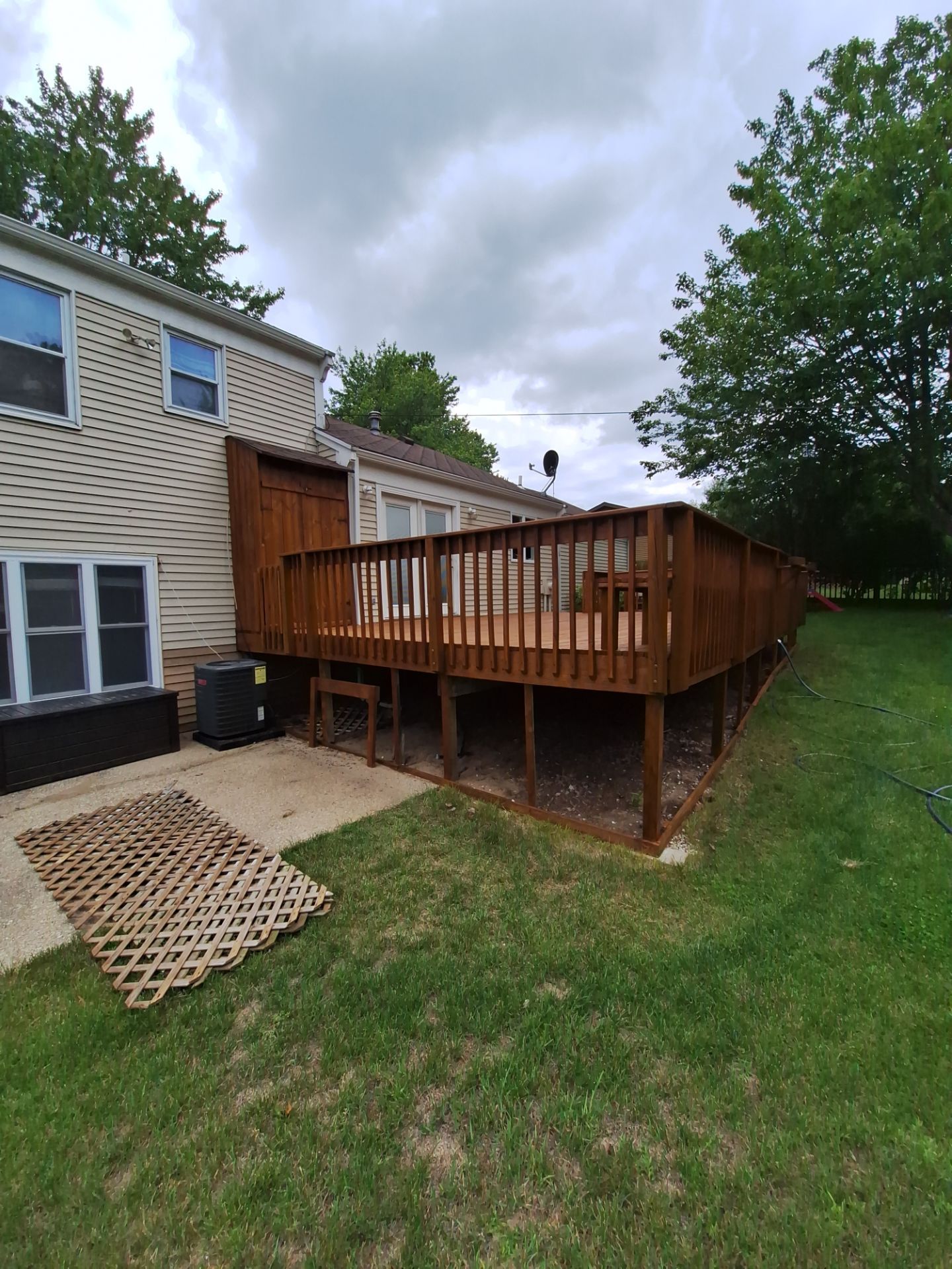 Deck Wash & Stain Transformation | Spring Lake, Michigan by Gordon Painting