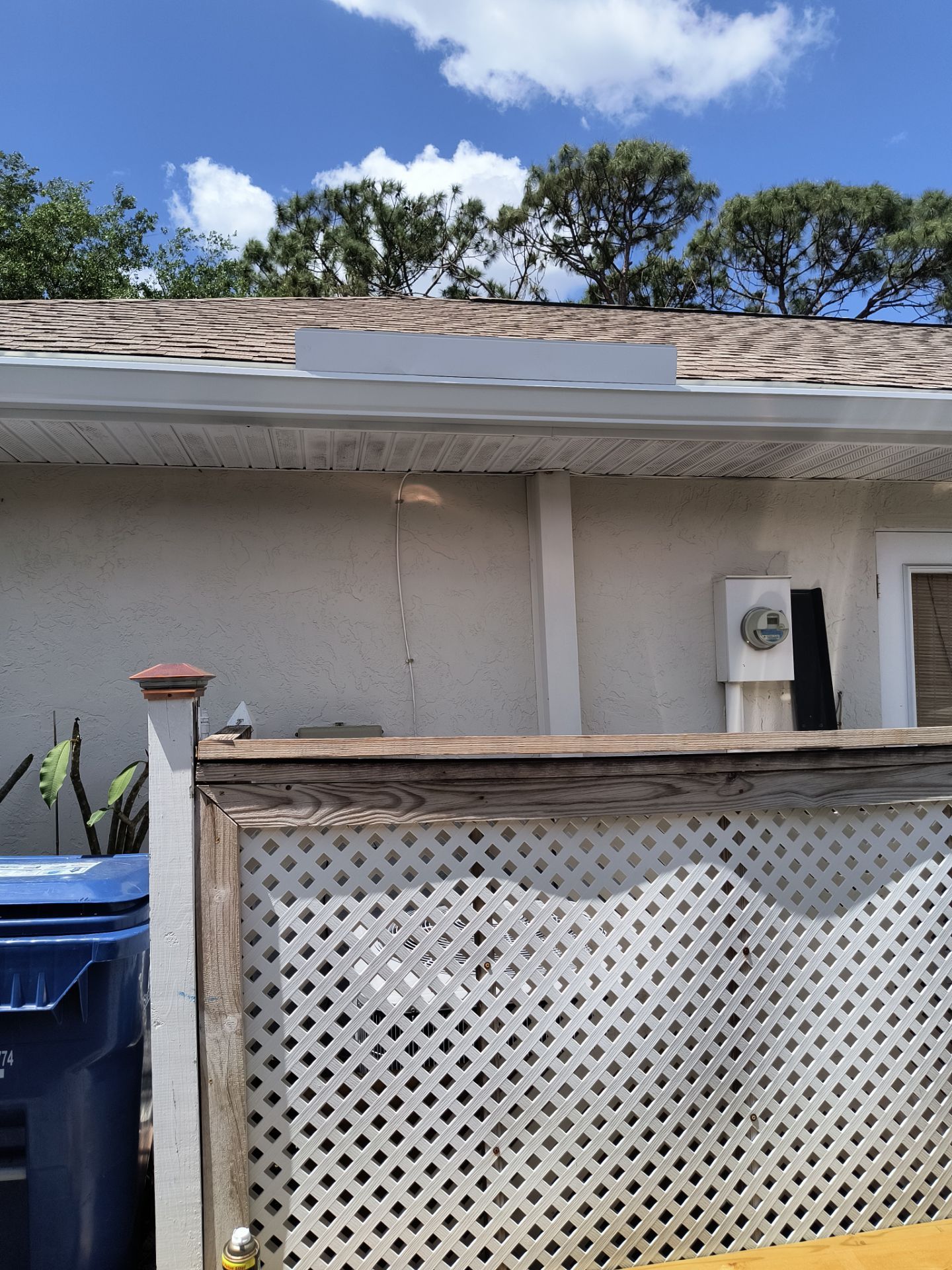Gutter Project with White 6-K Seamless Gutters Installation and Downspouts in Sarasota FL by Gutter Professors