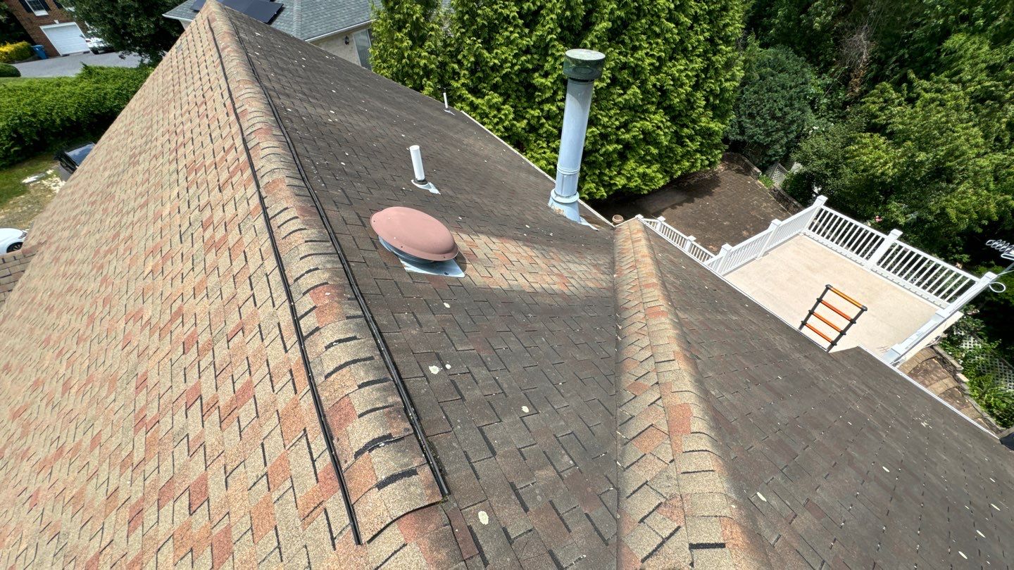 McLean: Residential Roof Installation with Landmark Pro Designer Shingles in Max Def Moire Black by RM Banning, Inc.