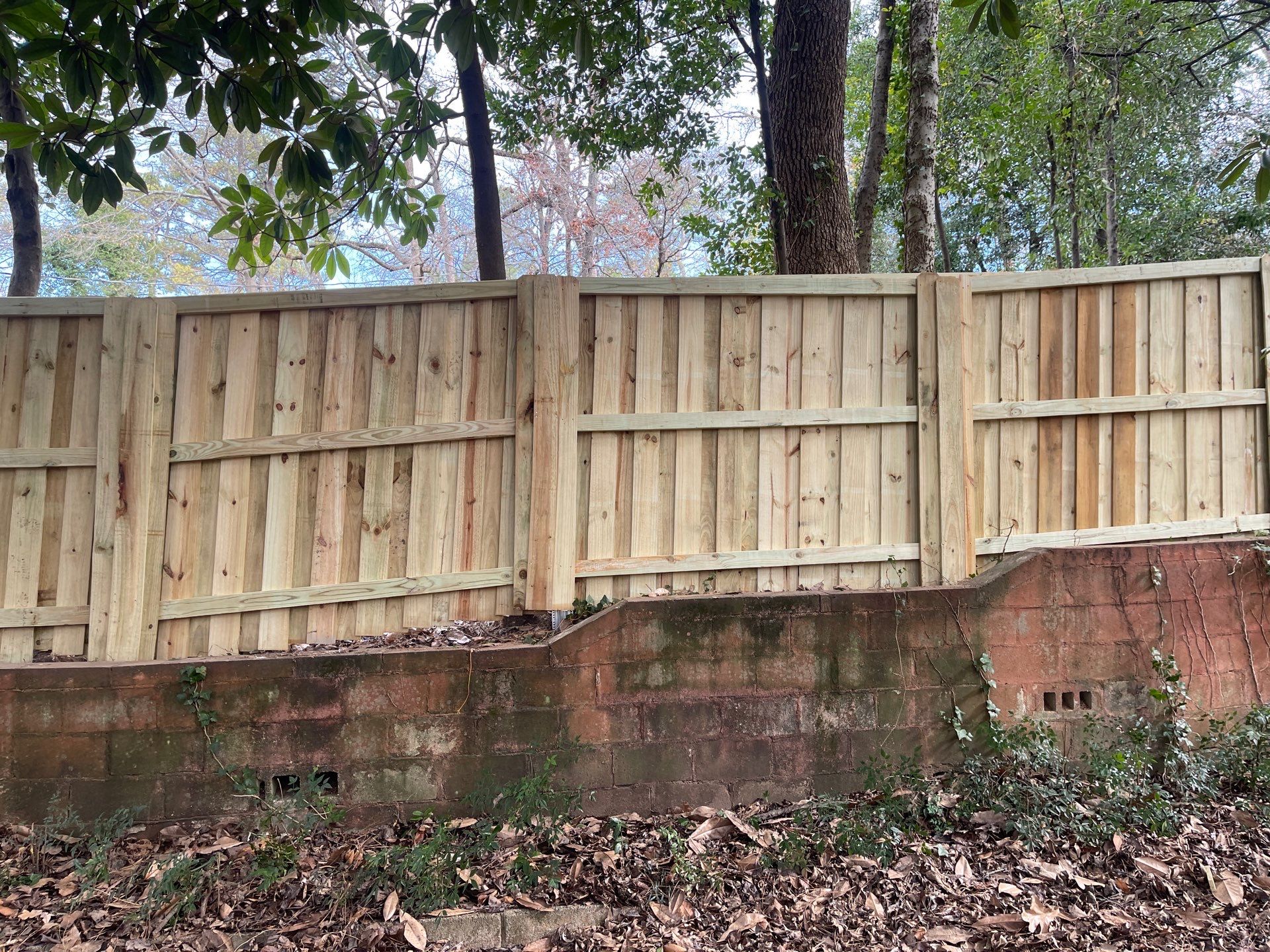 Crestline - Board on Board Fence by Pillar and Pine