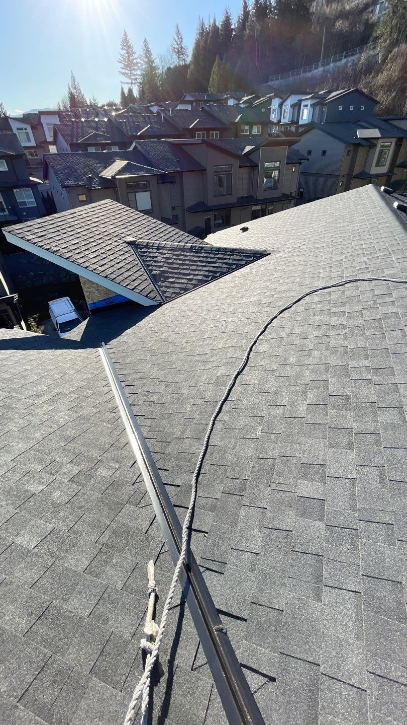 Residential Roofing Installation using OC Oakridge shingles by Top Notch Roofing Inc