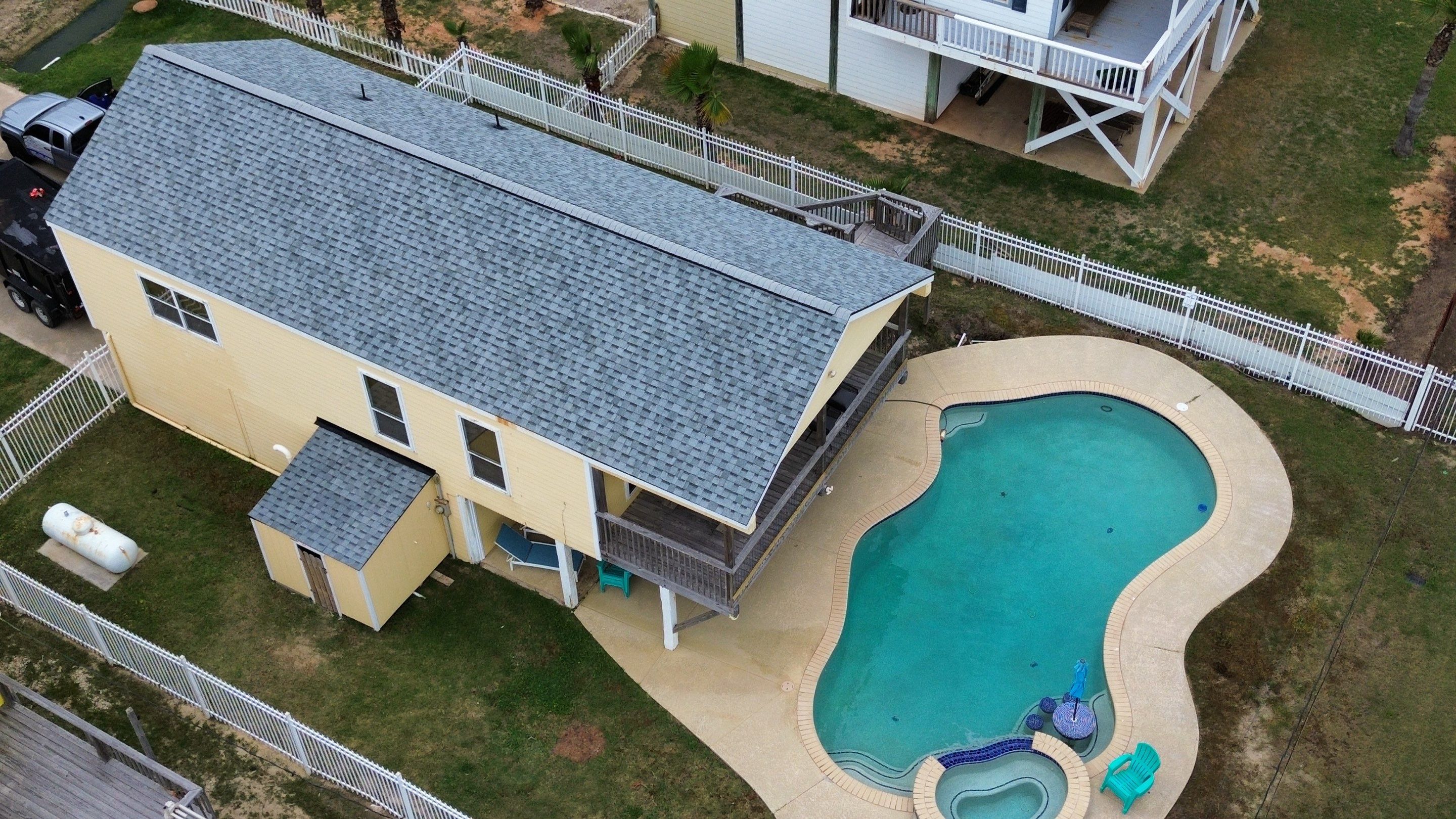 Roof Replacement using IKO Cambridge Dual Grey by CAP Roofing and Construction LLC