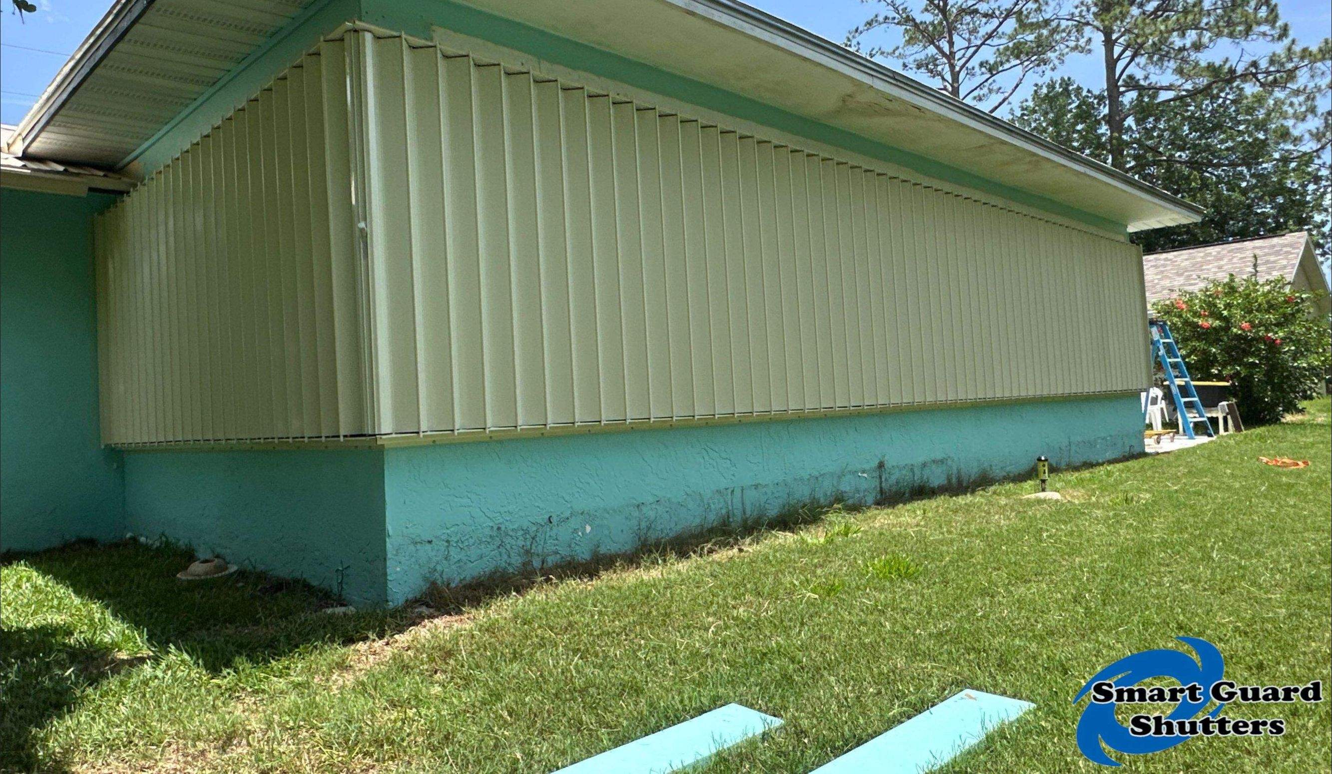 Accordion Shutter in Ivory by Smart Guard Shutters