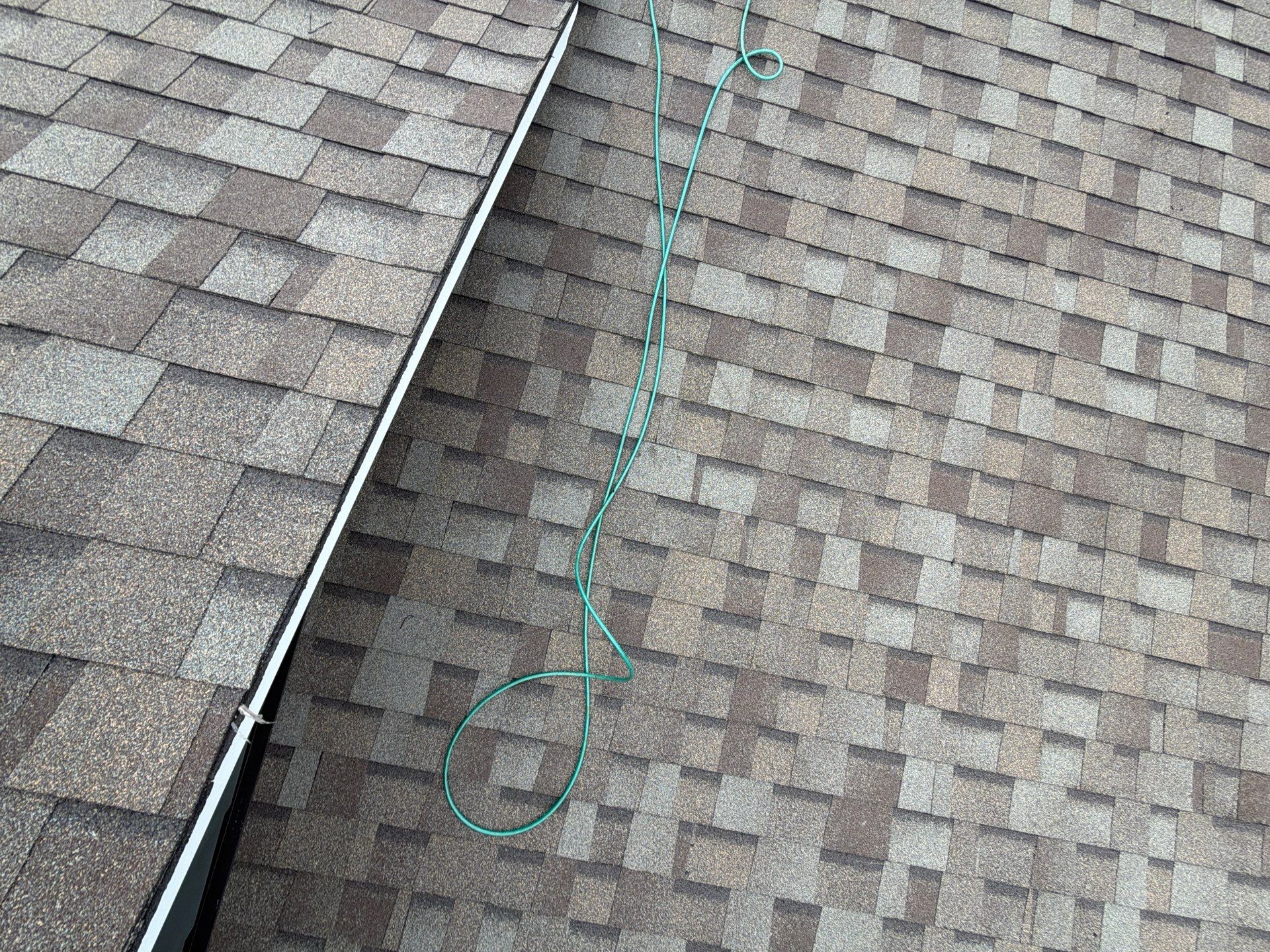 Roof Replacement and White Gutter Installation in Gloucester by Cade Construction