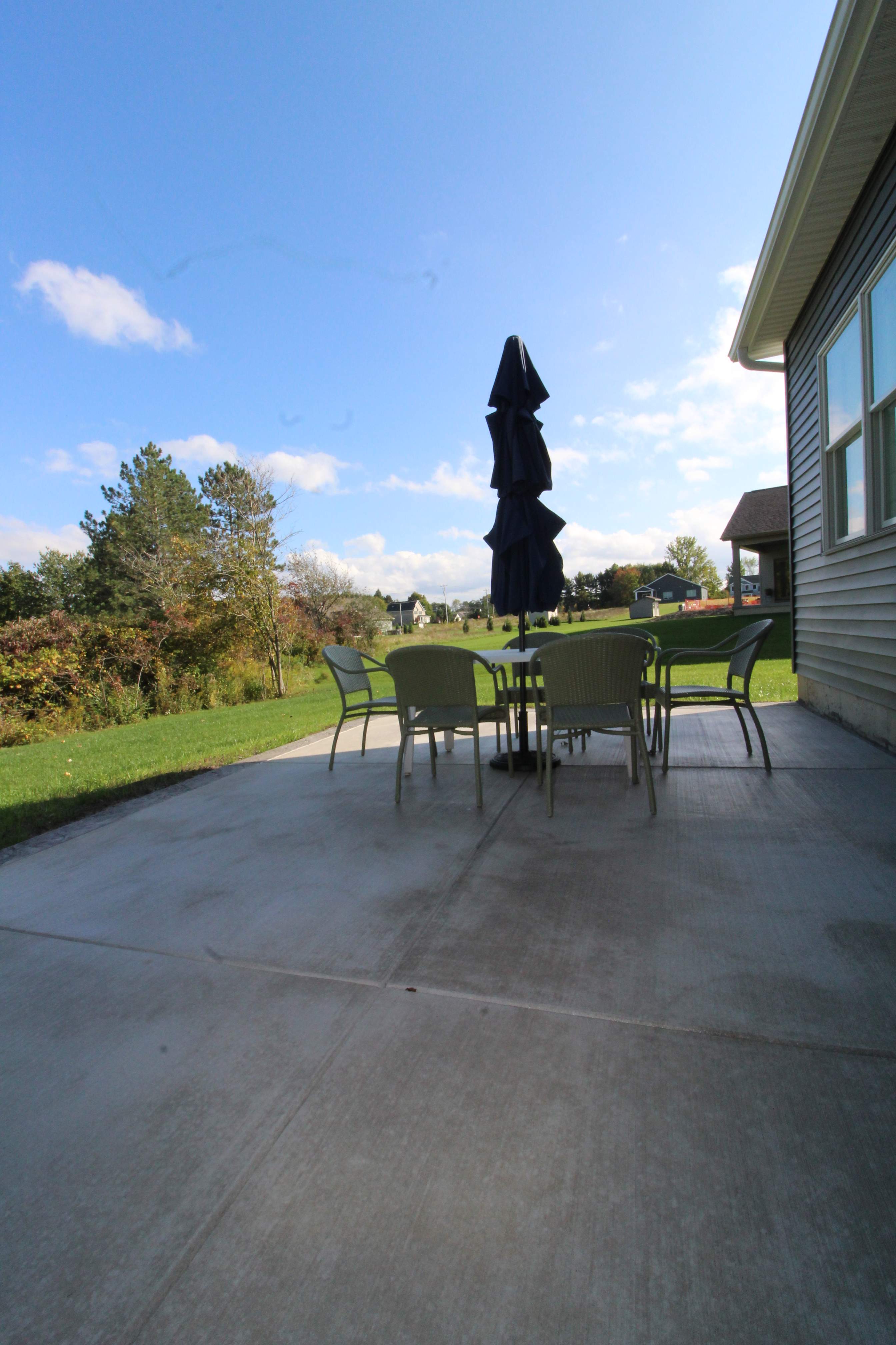 Outdoor Living- Deck and Concrete by Ivy Lea Construction