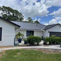 24ga 1.5" Mechanical Seam Dark Bronze by Total Roofing System The Metal Roof Experts