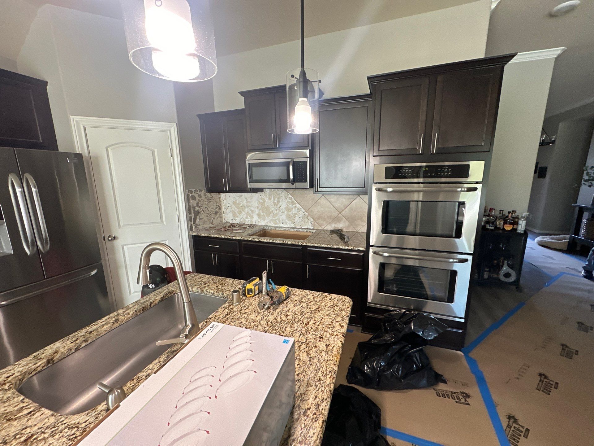 Kitchen Remodel and Outdoor Fireplace in Tomball, TX by SophAlx LLC