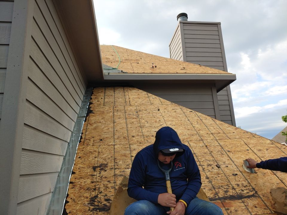 Residential Roof Replacement and Solar Panel Integration in Austin by Caliber Restoration LLC