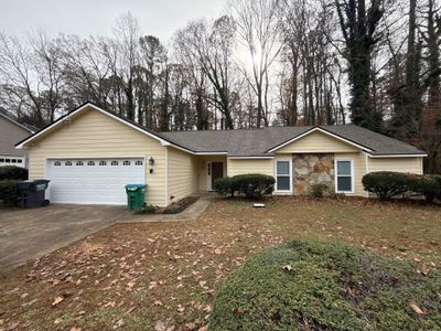 Norcross Exterior Remodel With New Lap Siding and Window Installation
