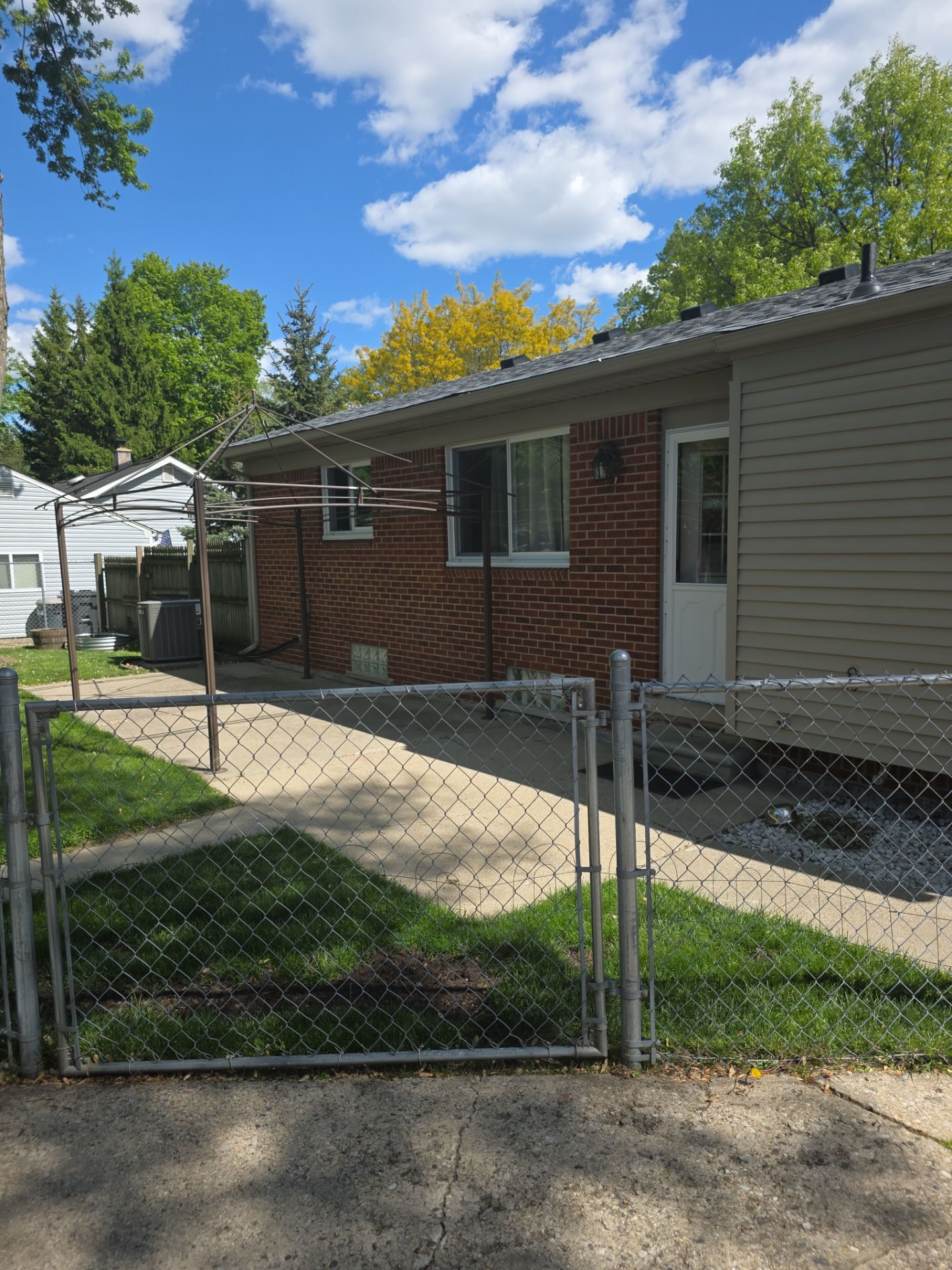 Exterior Brick Staining Transformation by Top Shelf Painter