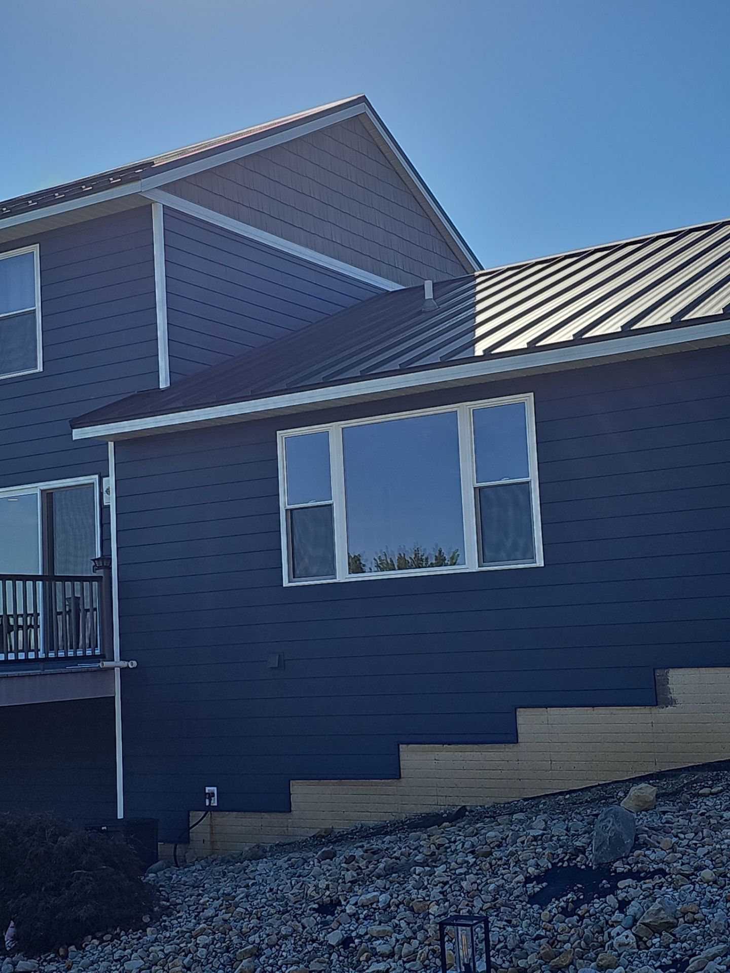 Jackson Center -Roof/Siding Replacement by Nitro Roofing and Construction