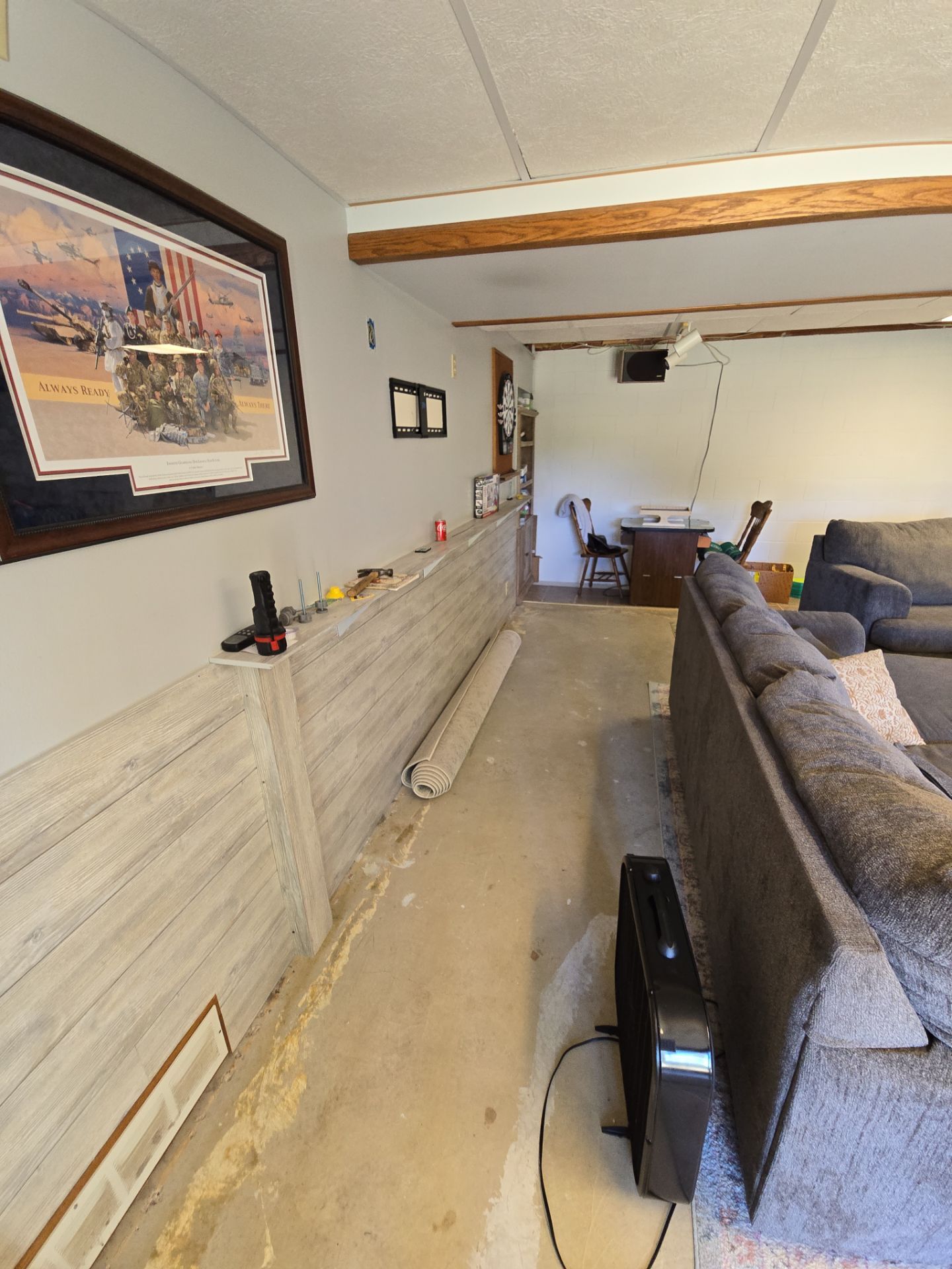 Solid Color Concrete Floor Coating for Renner Basement by Select Painting, Coatings & Garage Cabinets