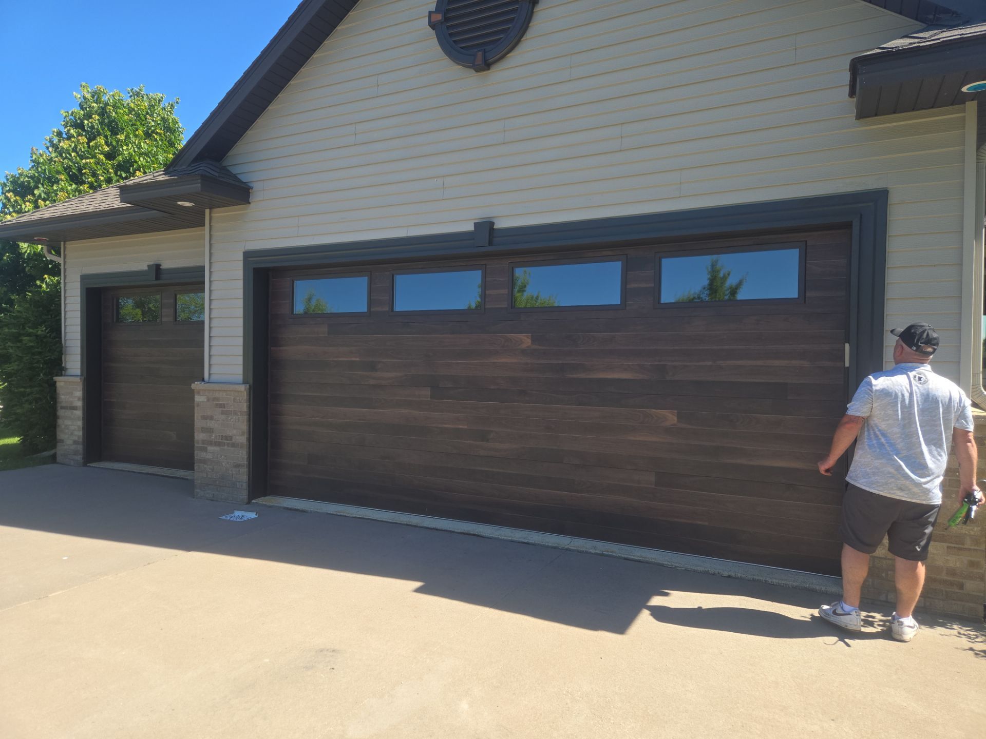 Bronze Garage Door Wrap with Two-Piece Diamond Bend by Next Level Seamless Gutters / Exteriors Inc.
