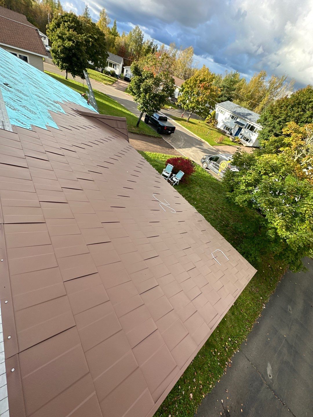 Residential Roofing Installation using Wakefield Bridge Steel Shingle by Ideal Steel by Artisan Roofing & Home Improvements Inc.