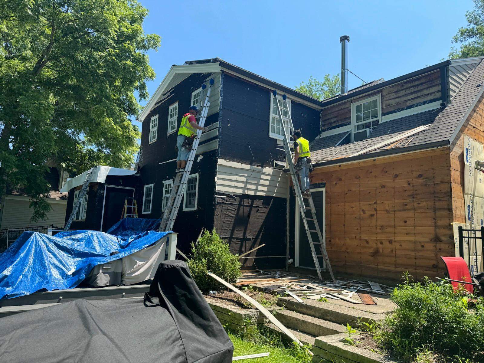 C.M.: Roof and siding by AFC Exteriors