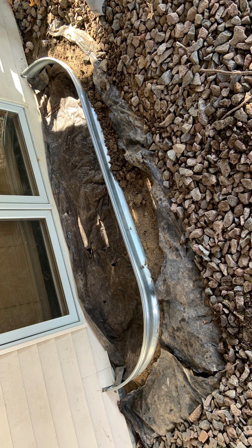 Basement Window Well & Drainage Board in Maple Grove, MN by Waterproofing Northeast