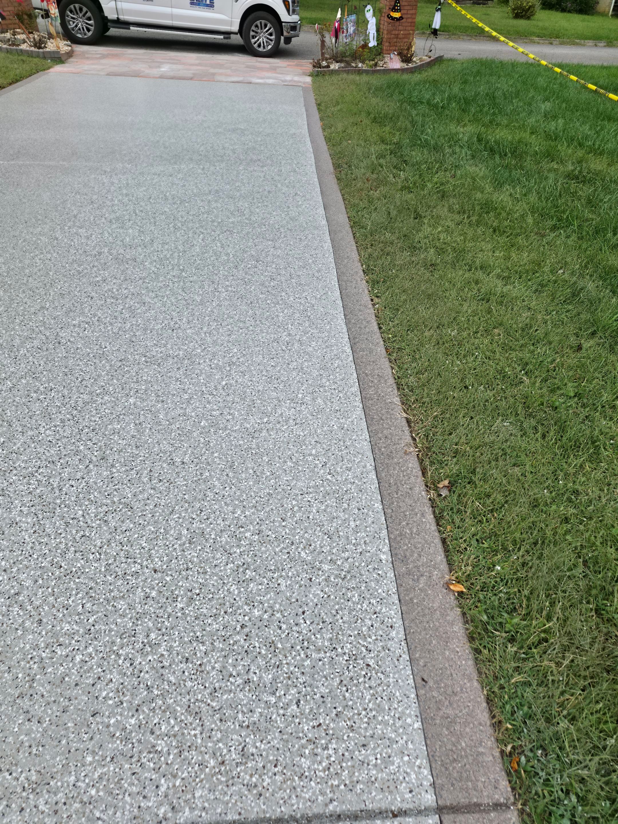 Driveway Using Creekbed and Garnet by Elite Floor Solutions