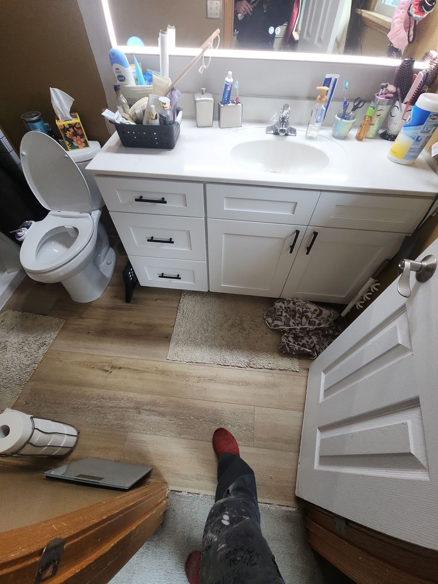 Bathroom Remodel using Luxury Vinyl Plank by The Shower Company