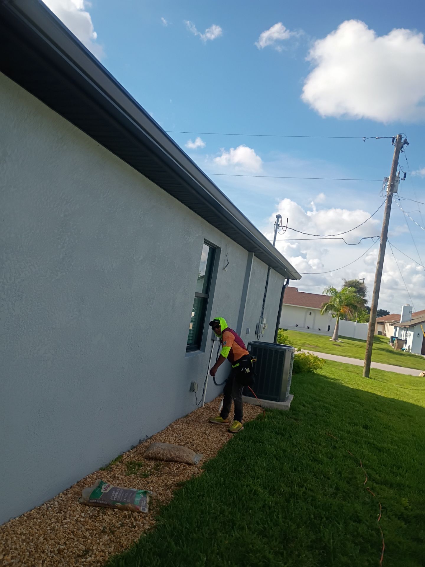 Dark Bronze Seamless Gutters using 6 Inch Seamless Gutters in Cape Coral FL by Gutter Professors