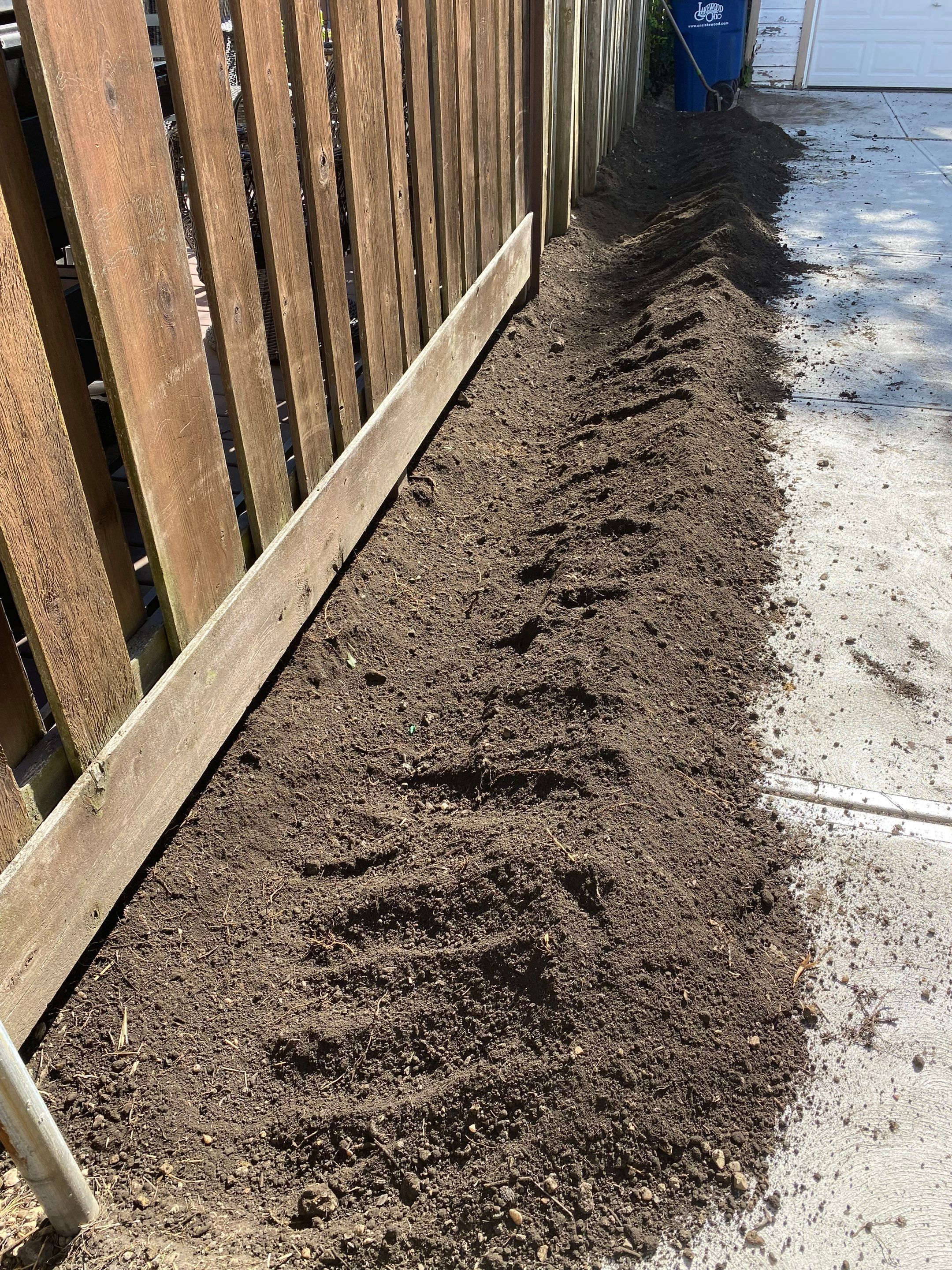Green Fenceline Install by Elm Rose Gardens