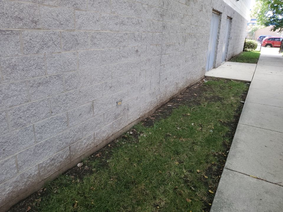 commercial pressure washing using Algaecide, soft wash soap by Northern Power Washing LLC.