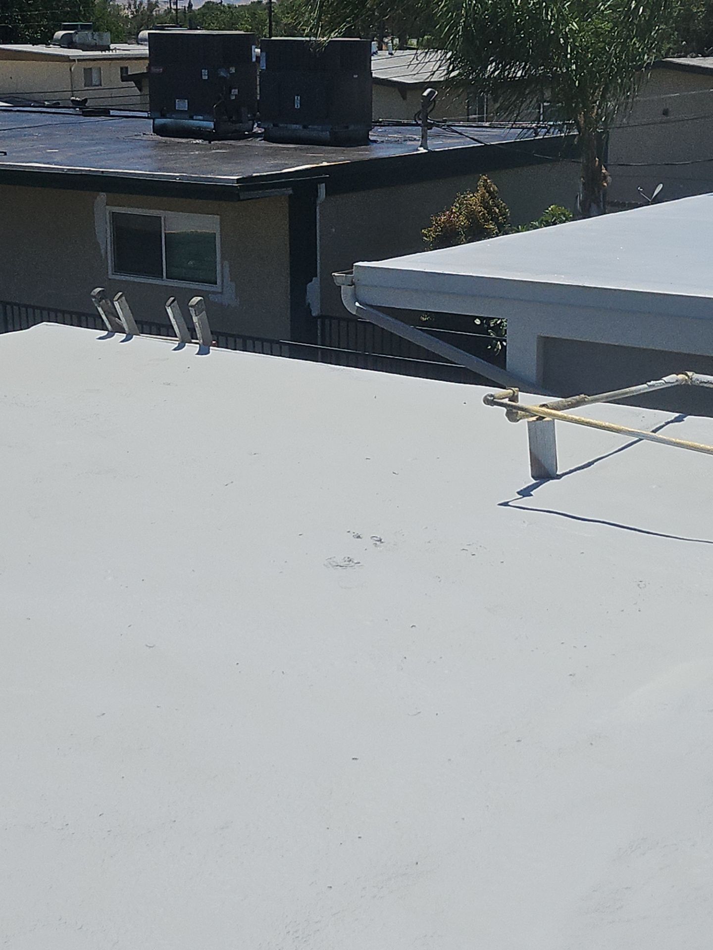Foam Refurbish using General Coatings acrylic coatings and spray foam by Straight Edge Roofing Inc