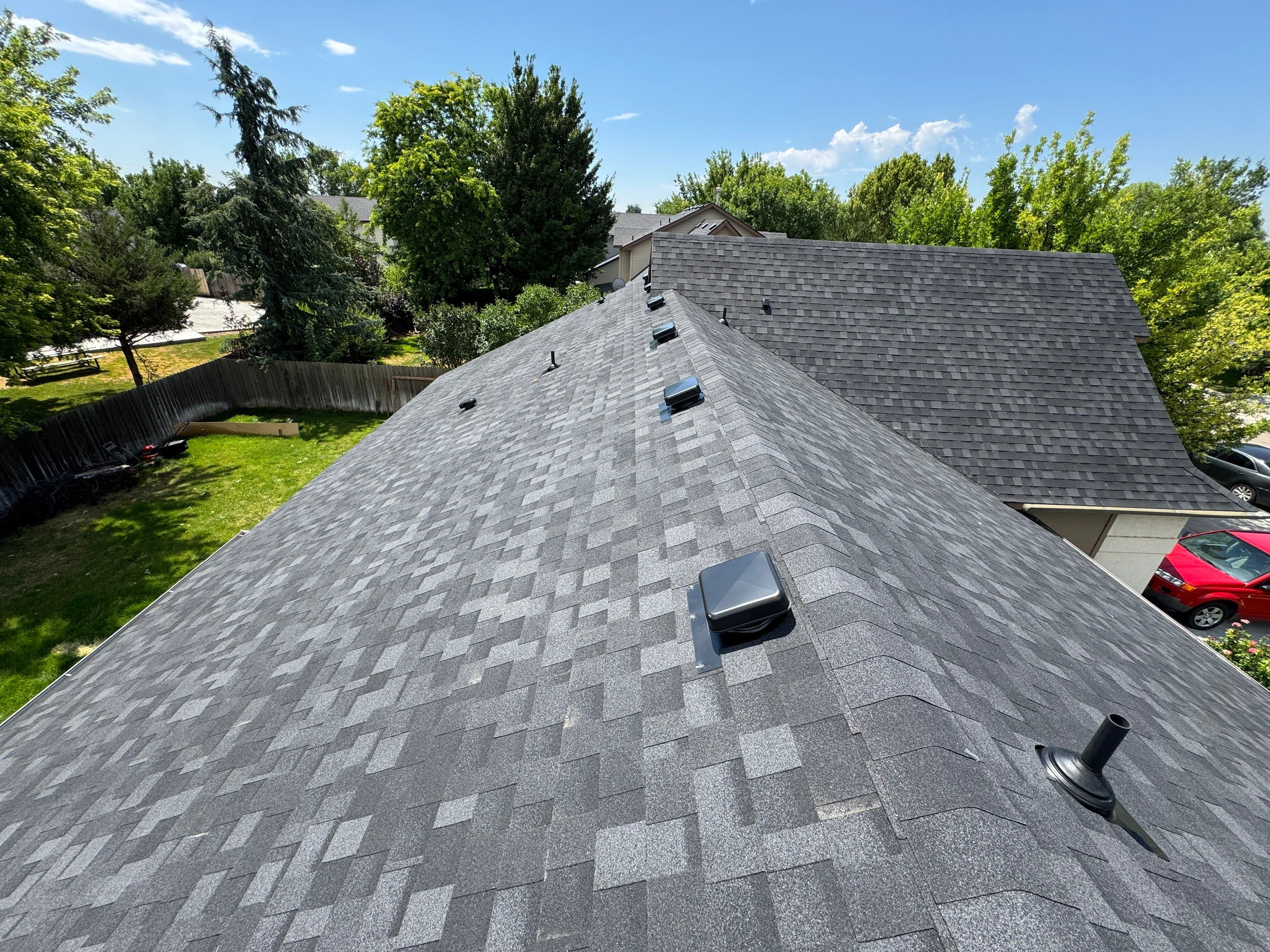 Residential Roof Replacement Featuring Charcoal Grey Architectural Shingles by Olive Roofing