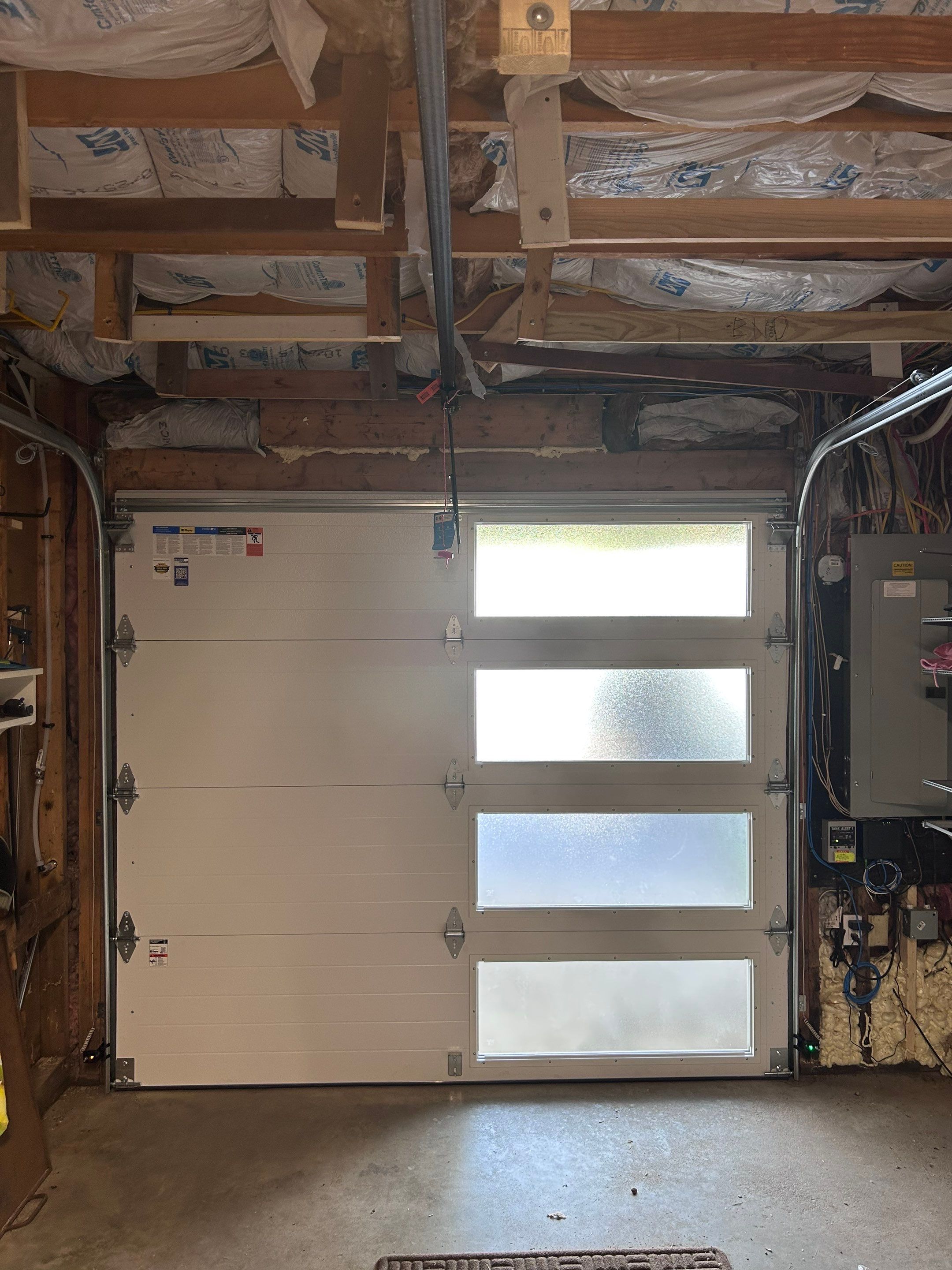 Door Installation using Clopay Modern Steel Garage Doors by Keene Door