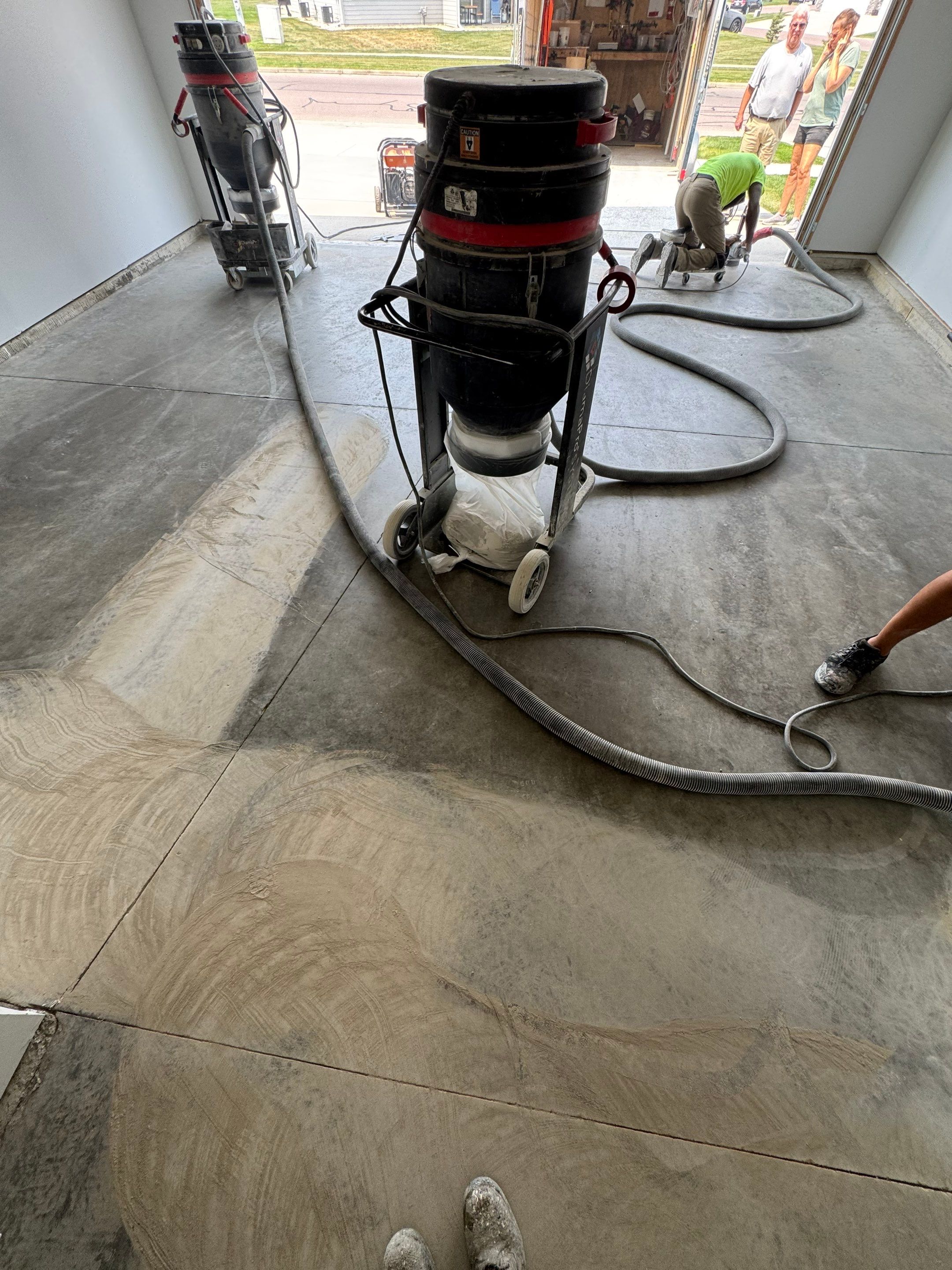 Custom Coyote Flake Garage Floor Coating in Sioux Falls by Select Painting, Coatings & Garage Cabinets