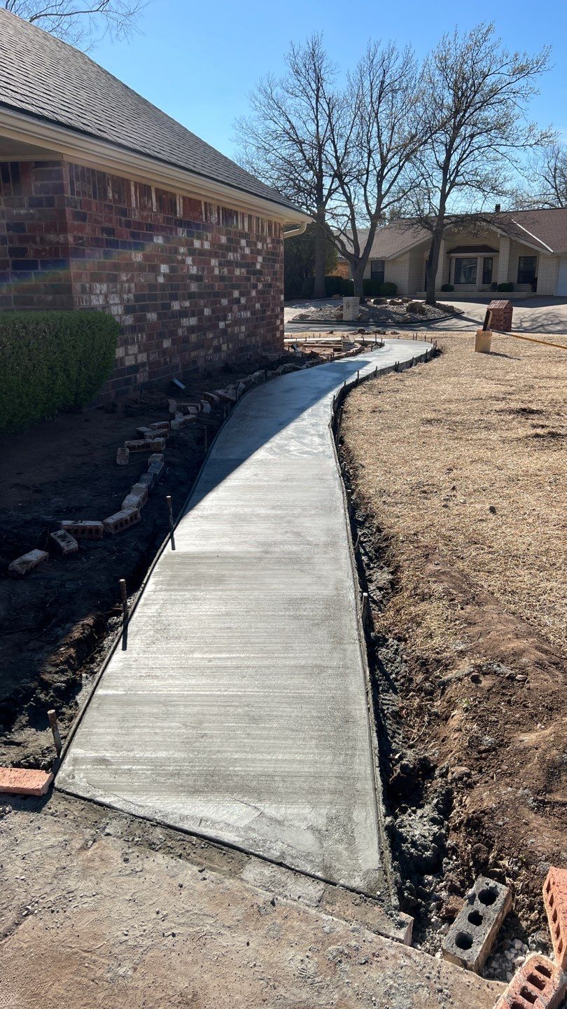 Concrete sidewalk using Concrete by Clays Services Inc