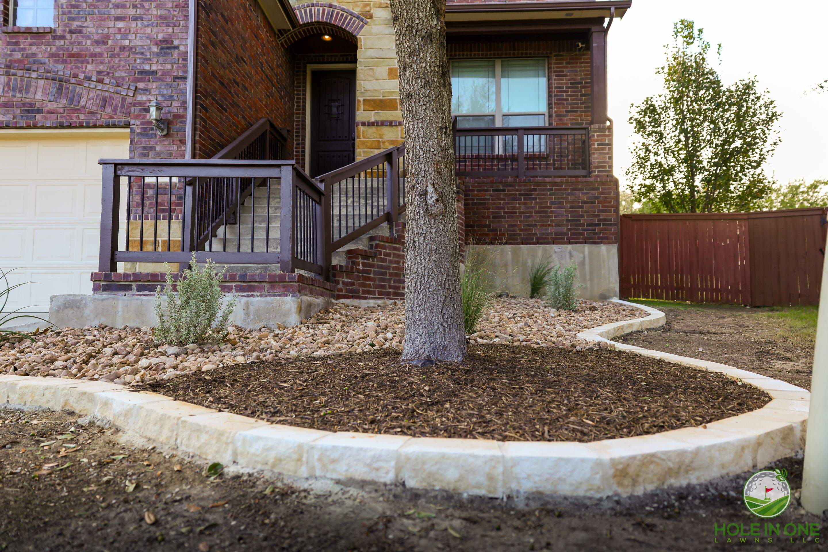 Low-Maintenance Front Yard Xeriscape with Chopstone Border, North San Antonio TX by Hole In One Lawns, LLC