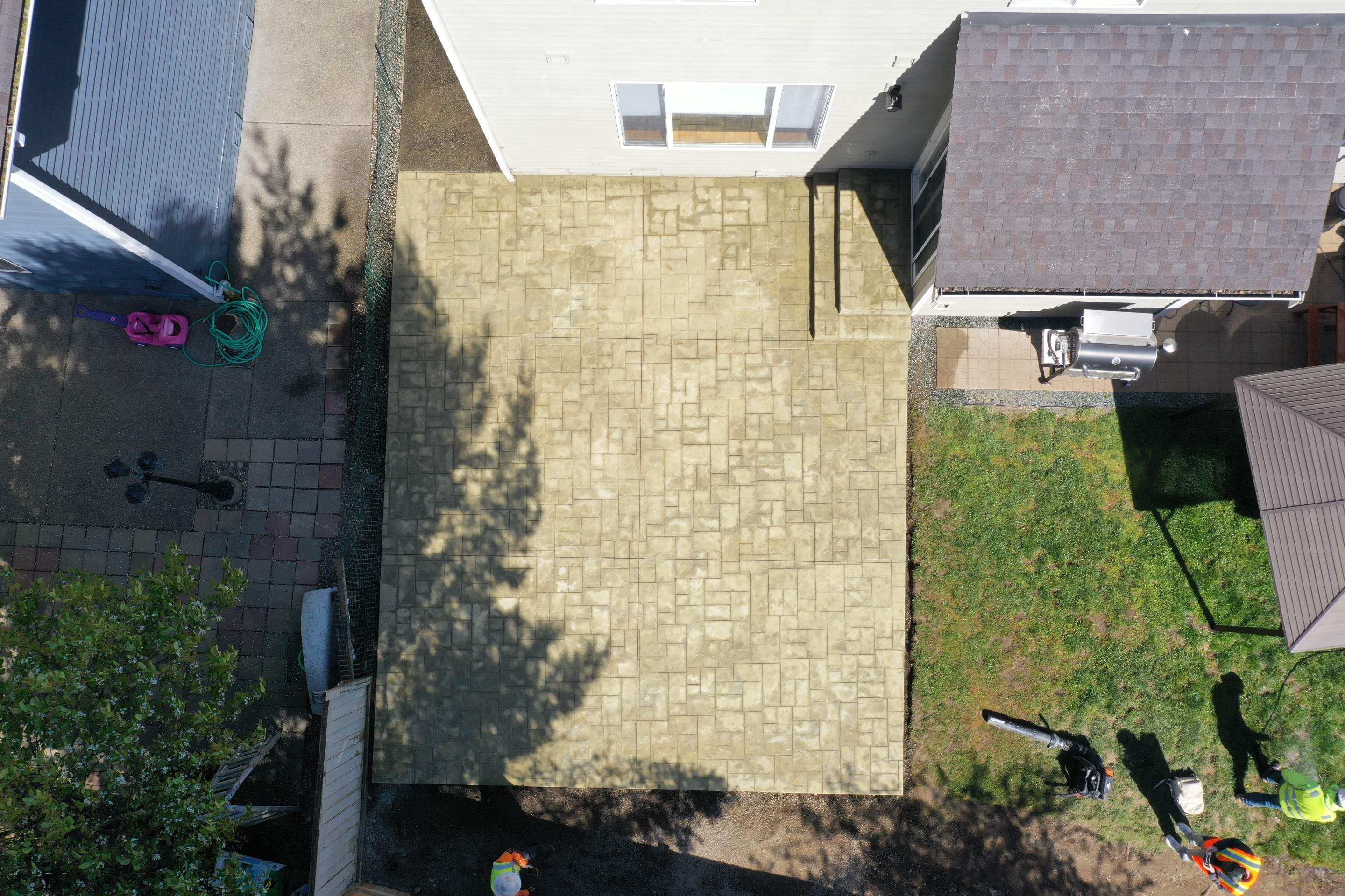 Benedict | Stamped Concrete Back Patio by Jireh Asphalt & Concrete Inc 