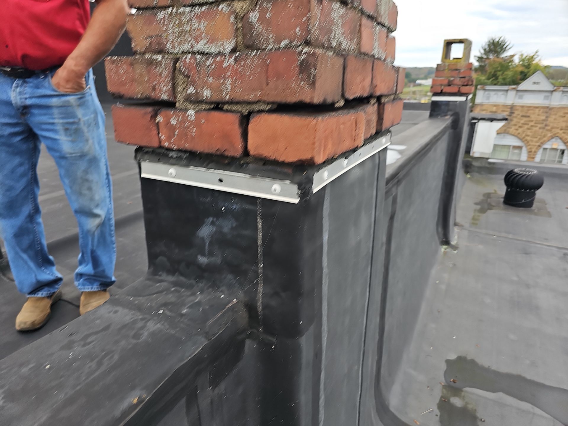 Western Auto  by 768 ROOF, LLC.