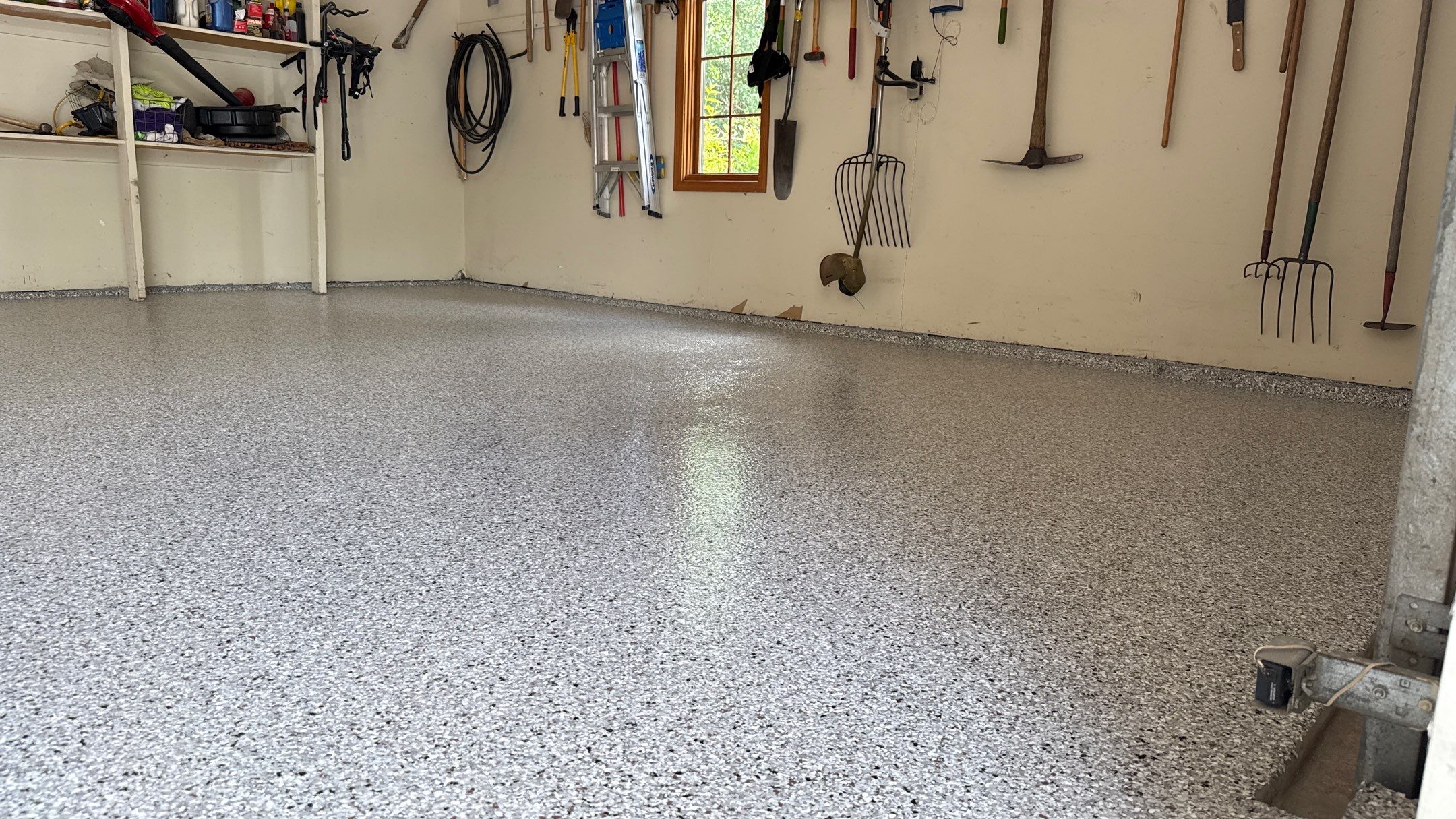 The Perfect Day To Install A Beautiful Coyote Flake Floor by Banner Garage