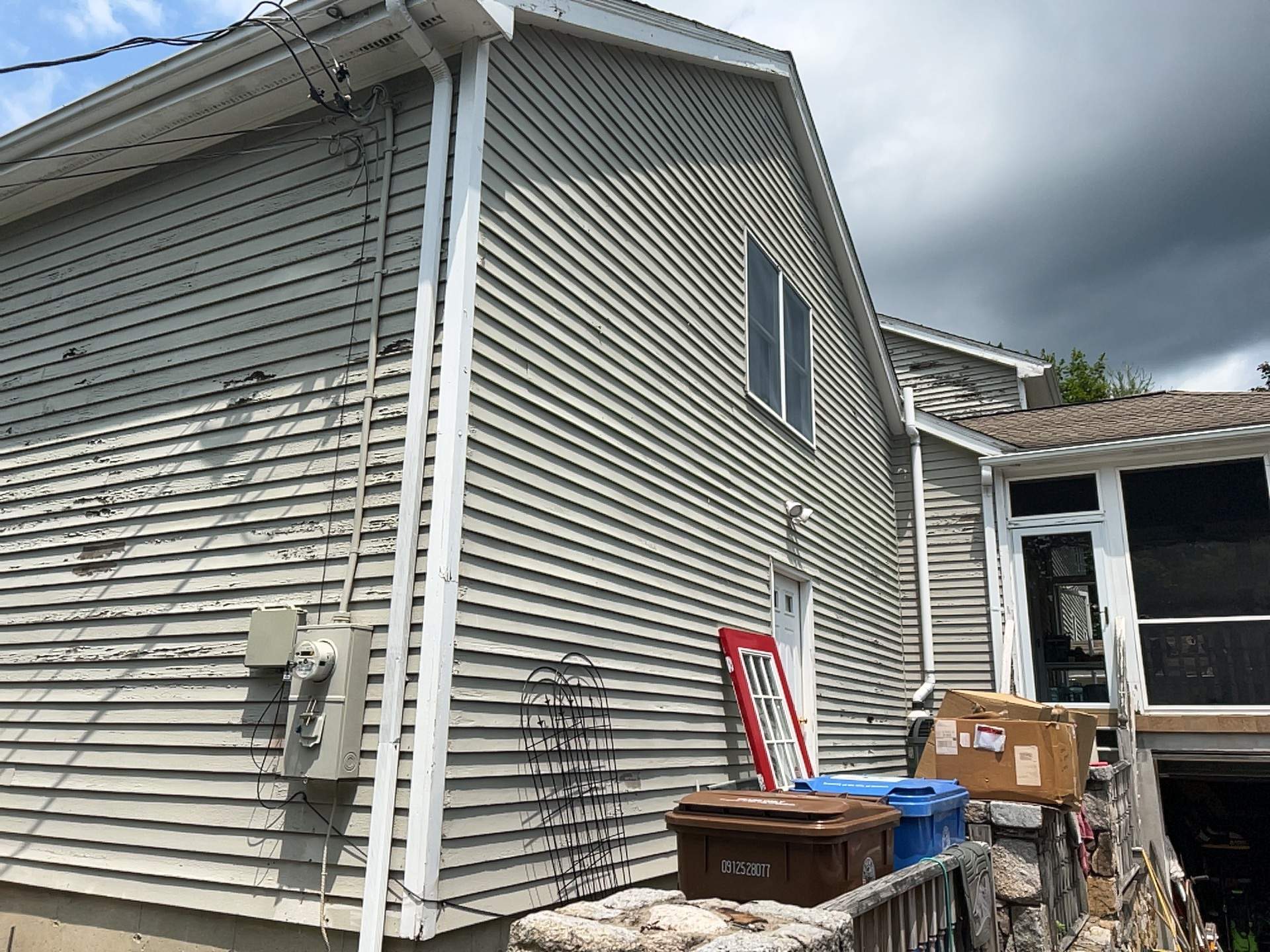 Siding Installation using Mainstreet Colonial & White gutters by A Plus Exterior