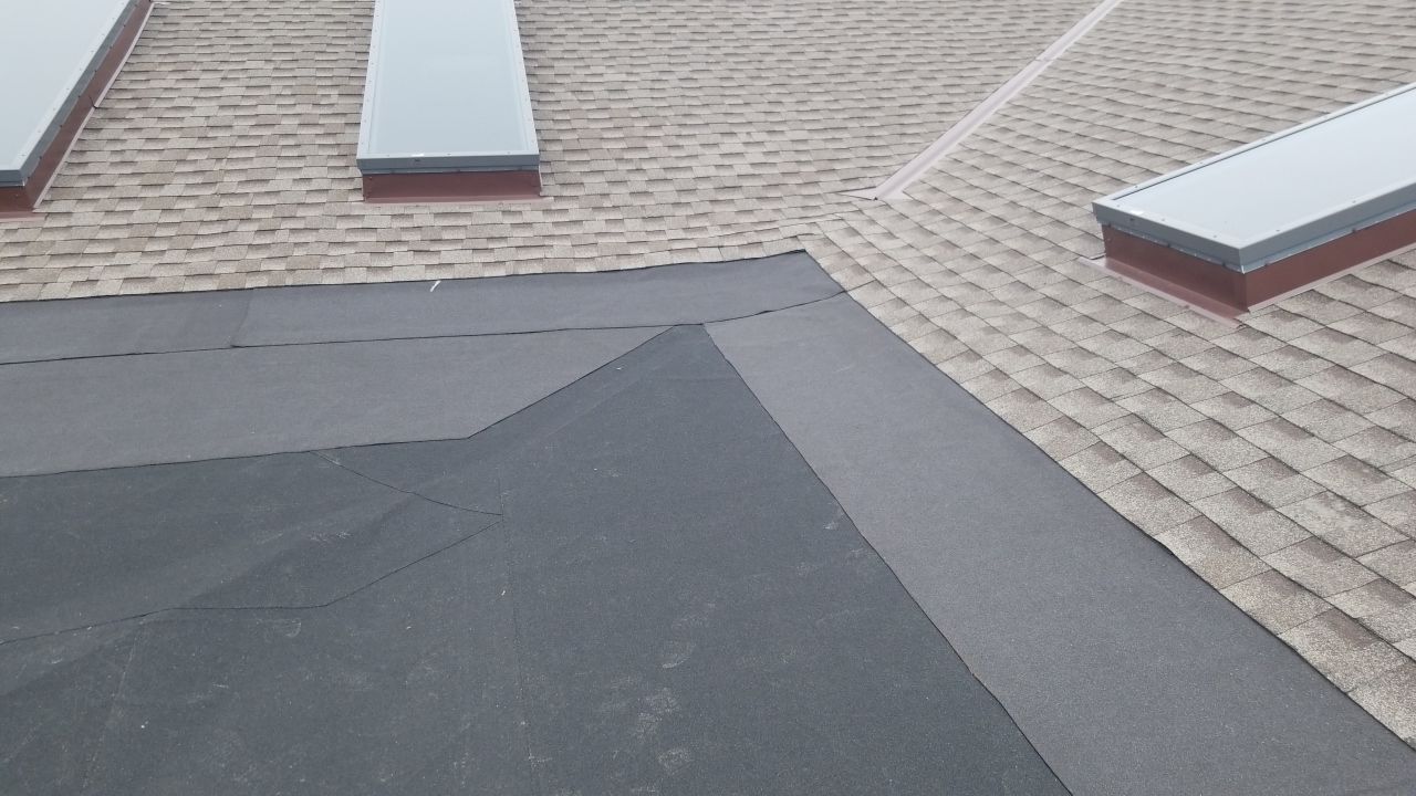 Skylight removal and install  by Absolute Roofing and Construction