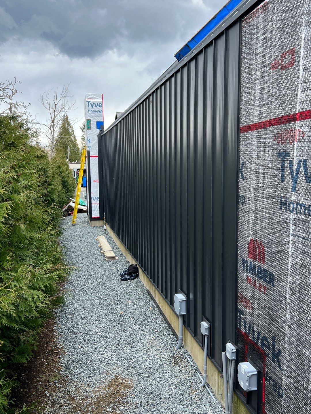 Residential Roofing and siding Installation using 12" Prolok metal  by Top Notch Roofing Inc