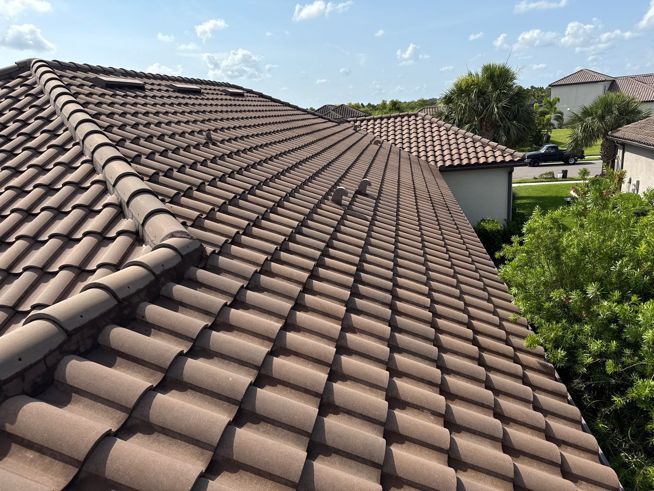 Soft Wash Roof Cleaning – Concrete Tile Roof | Artisan Lakes Esplanade, Palmetto, FL by Sunshine AquaWash