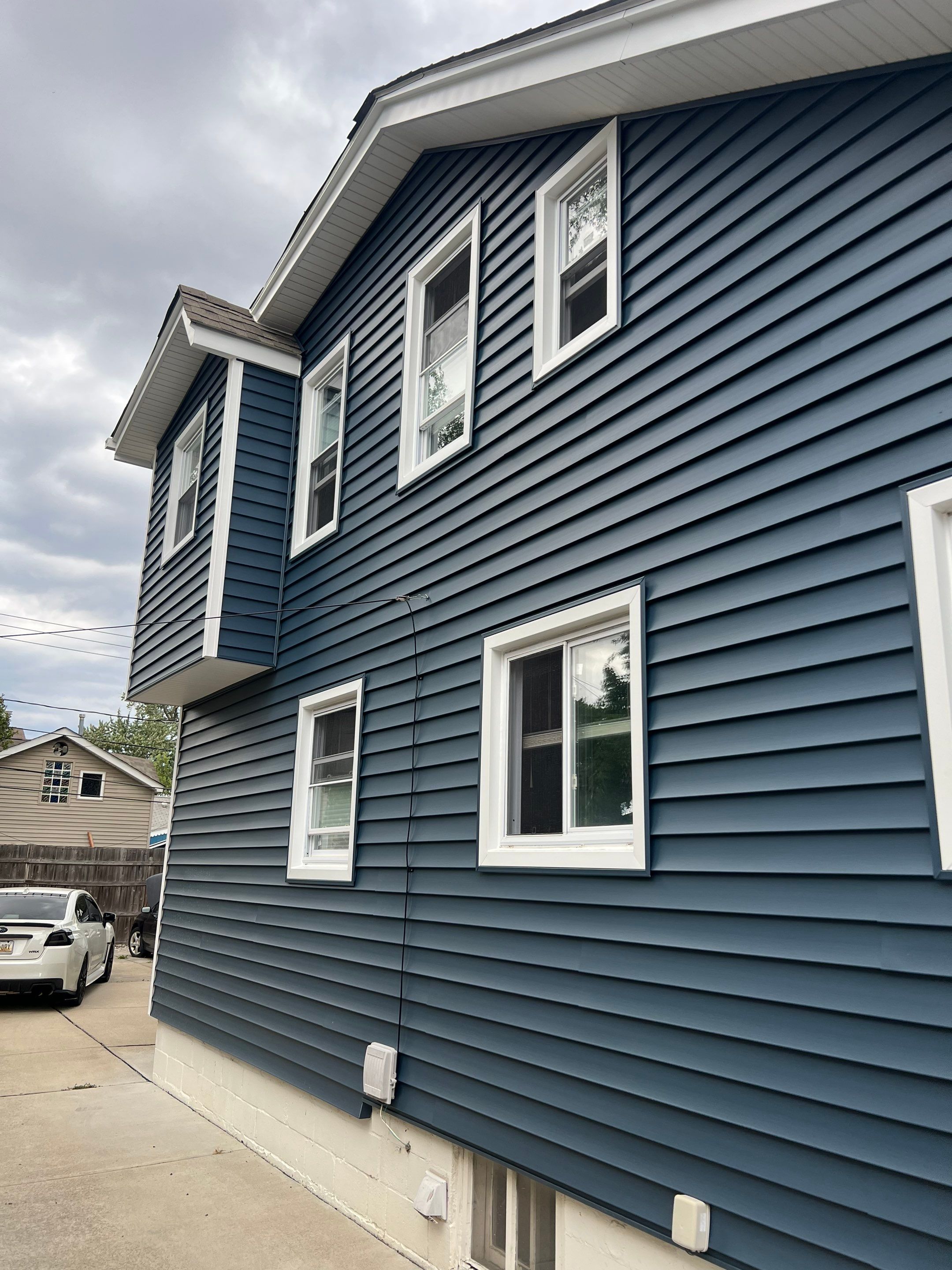 CertainTeed Vinyl Siding Replacement by Bloomfield Construction & Restoration