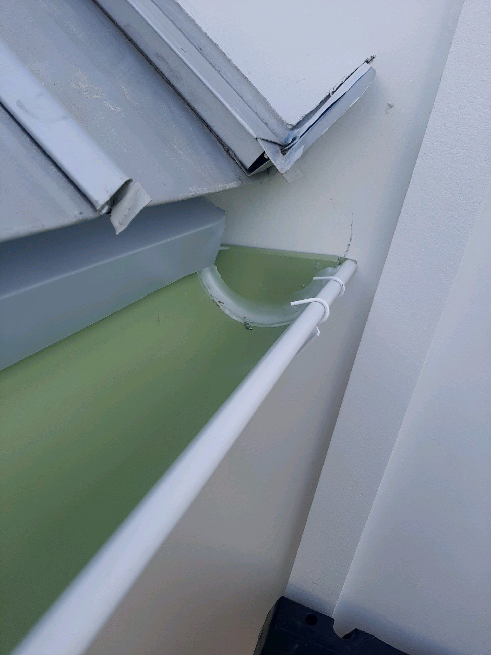 Gutter Installation Using 6 Inch Seamless Aluminum Gutters by Gutter Professors