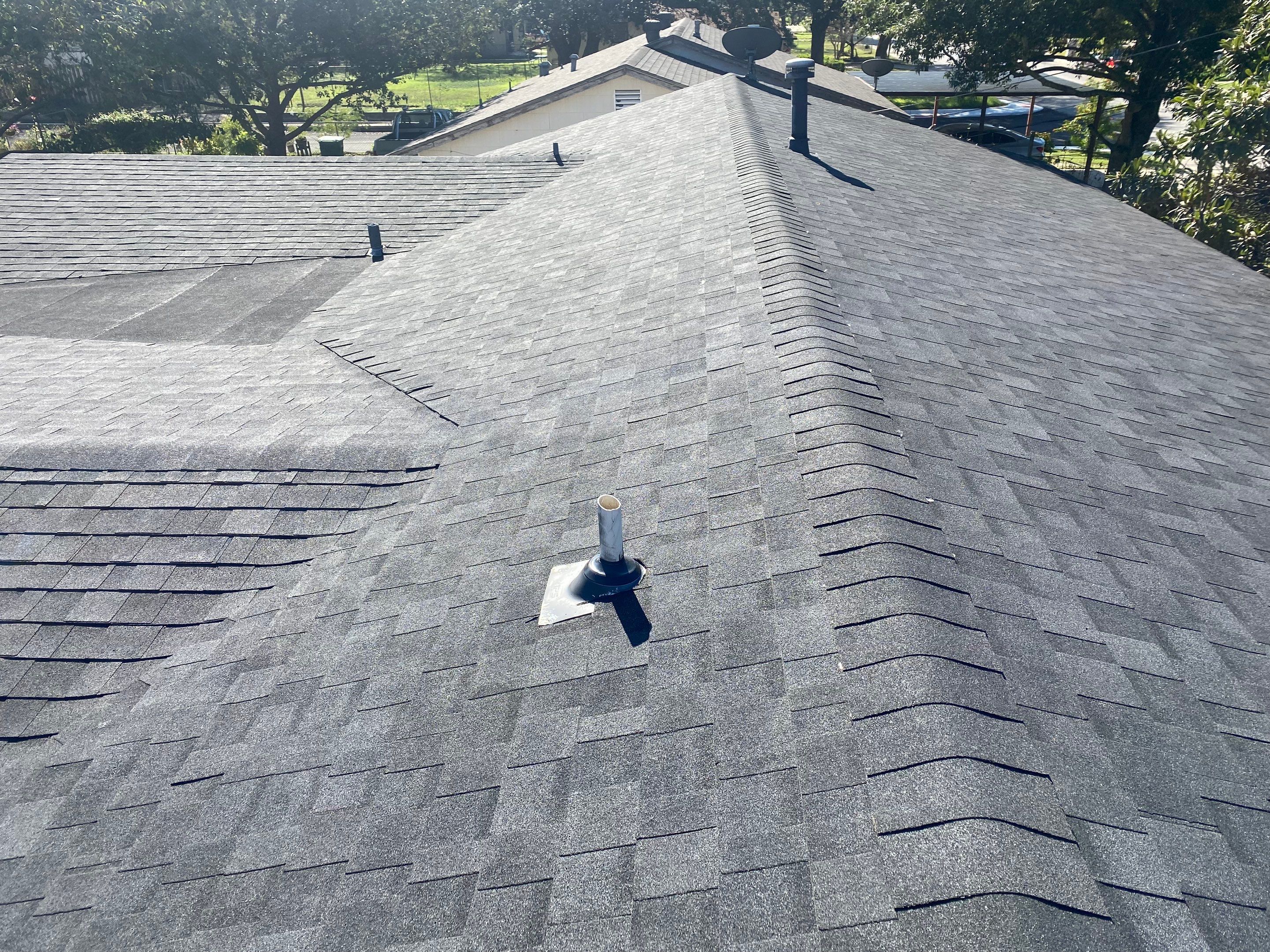 Estate Gray Shingles by Reimagine Roofing