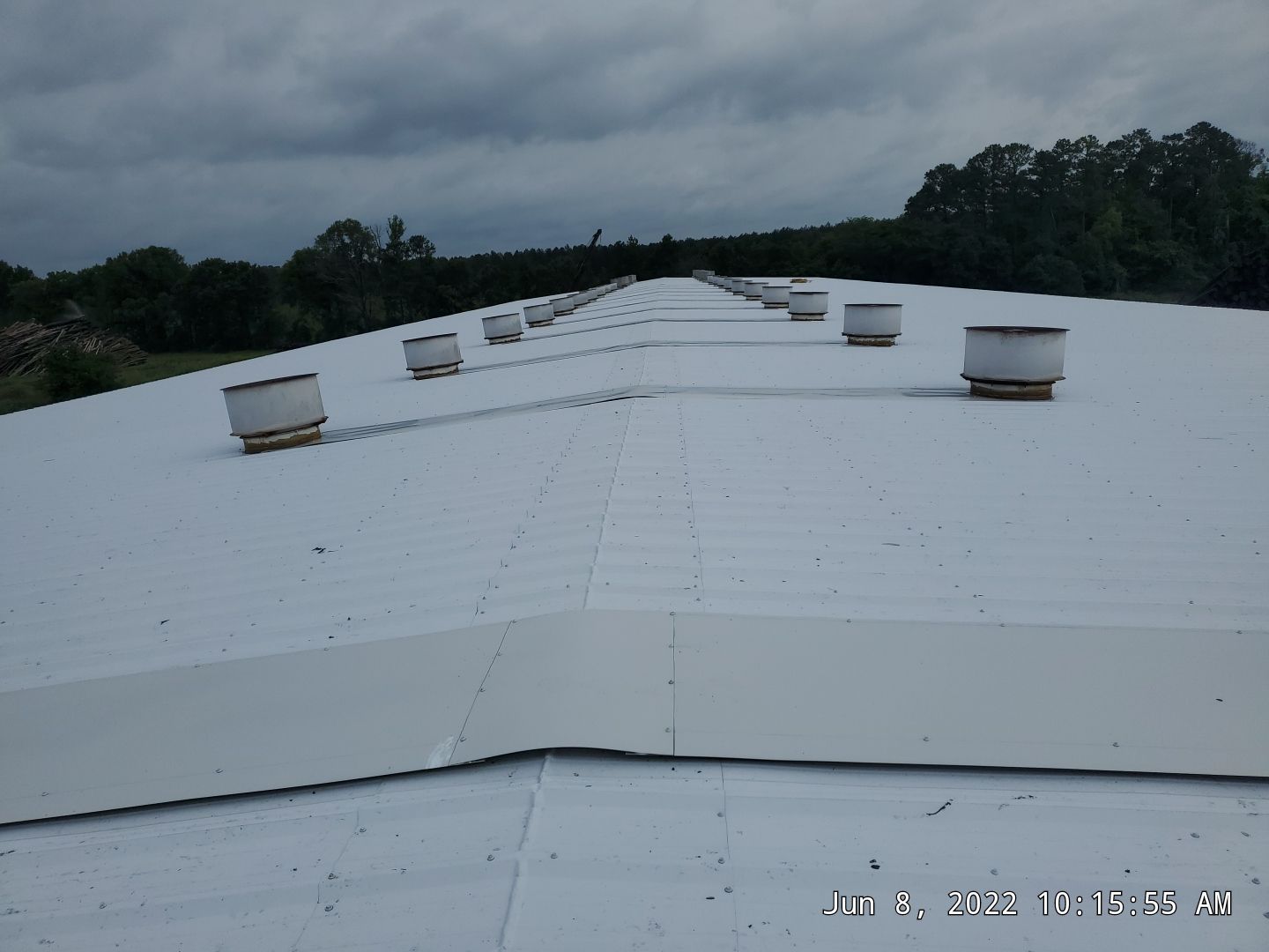 Commercial Roofing Installation using Aluminum Roofing panels by Hostetler Roofing