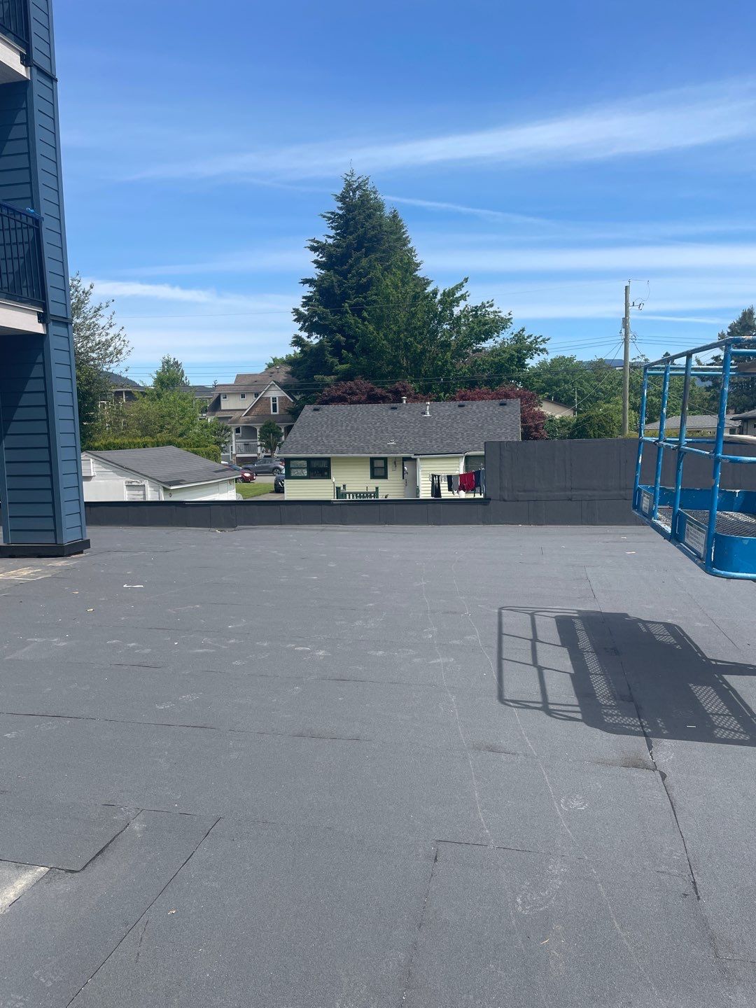 Large apartment with sbs, shingles and prolok metal  by Top Notch Roofing Inc