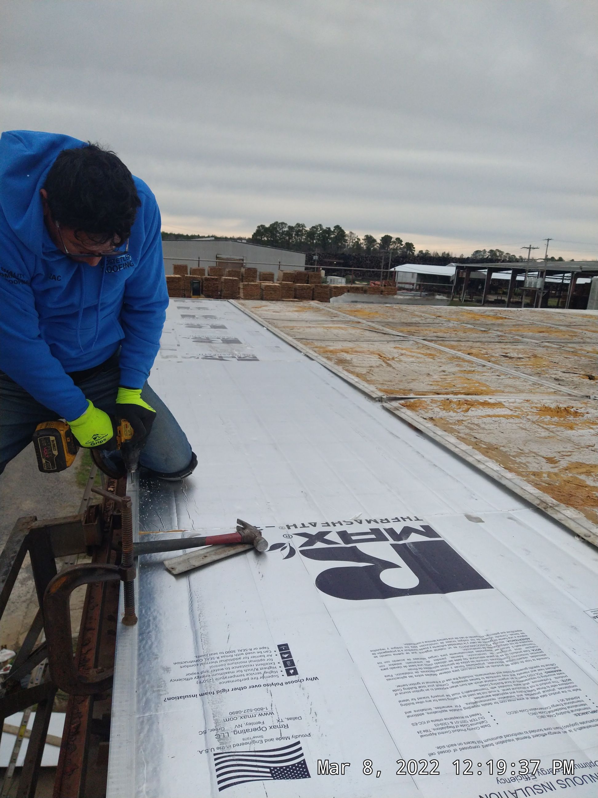 Commercial Roofing Installation using Aluminum Roofing panels by Hostetler Roofing