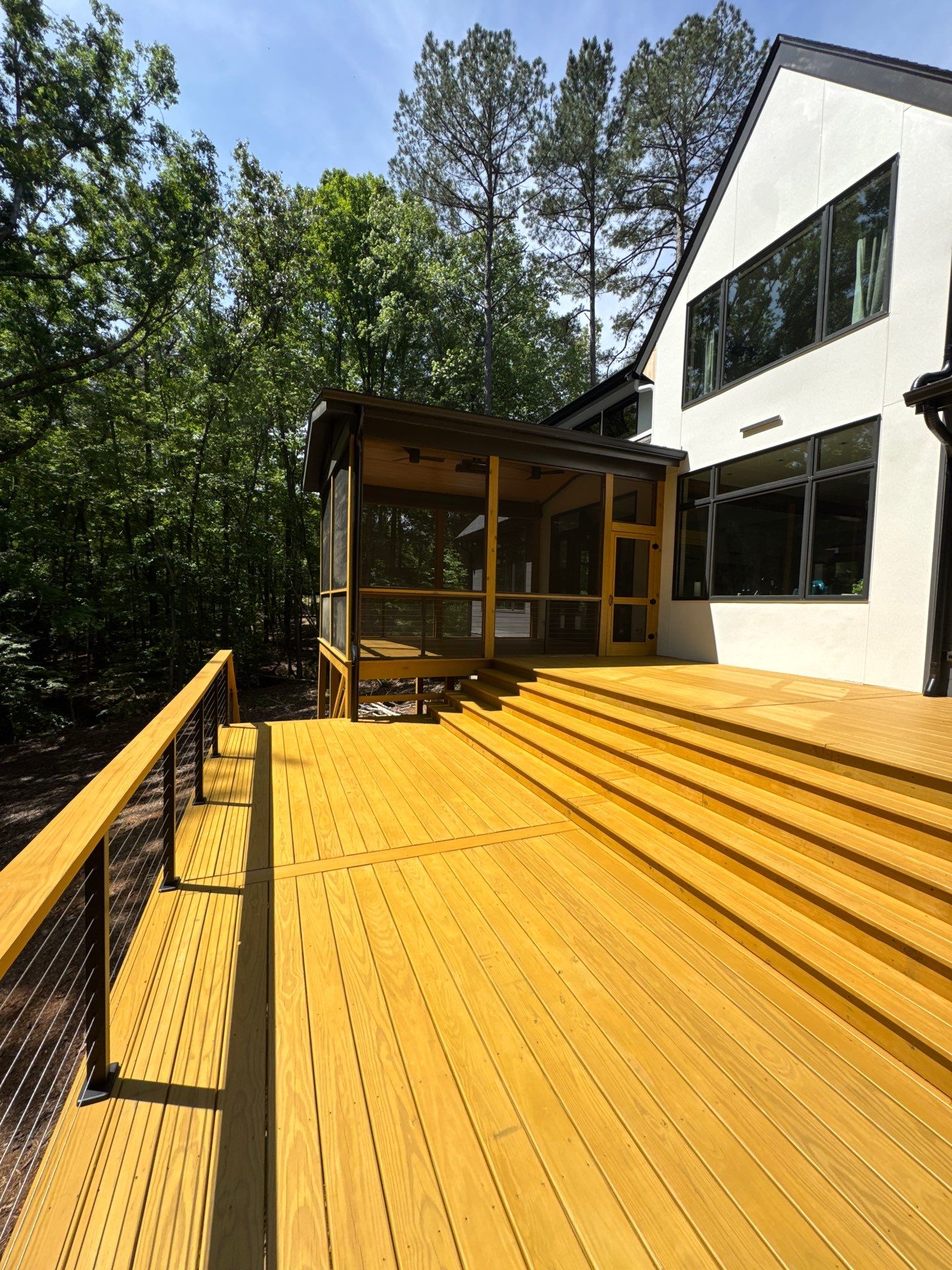 Porch and Deck staining  by GonzalezPainters & Contractors Inc 