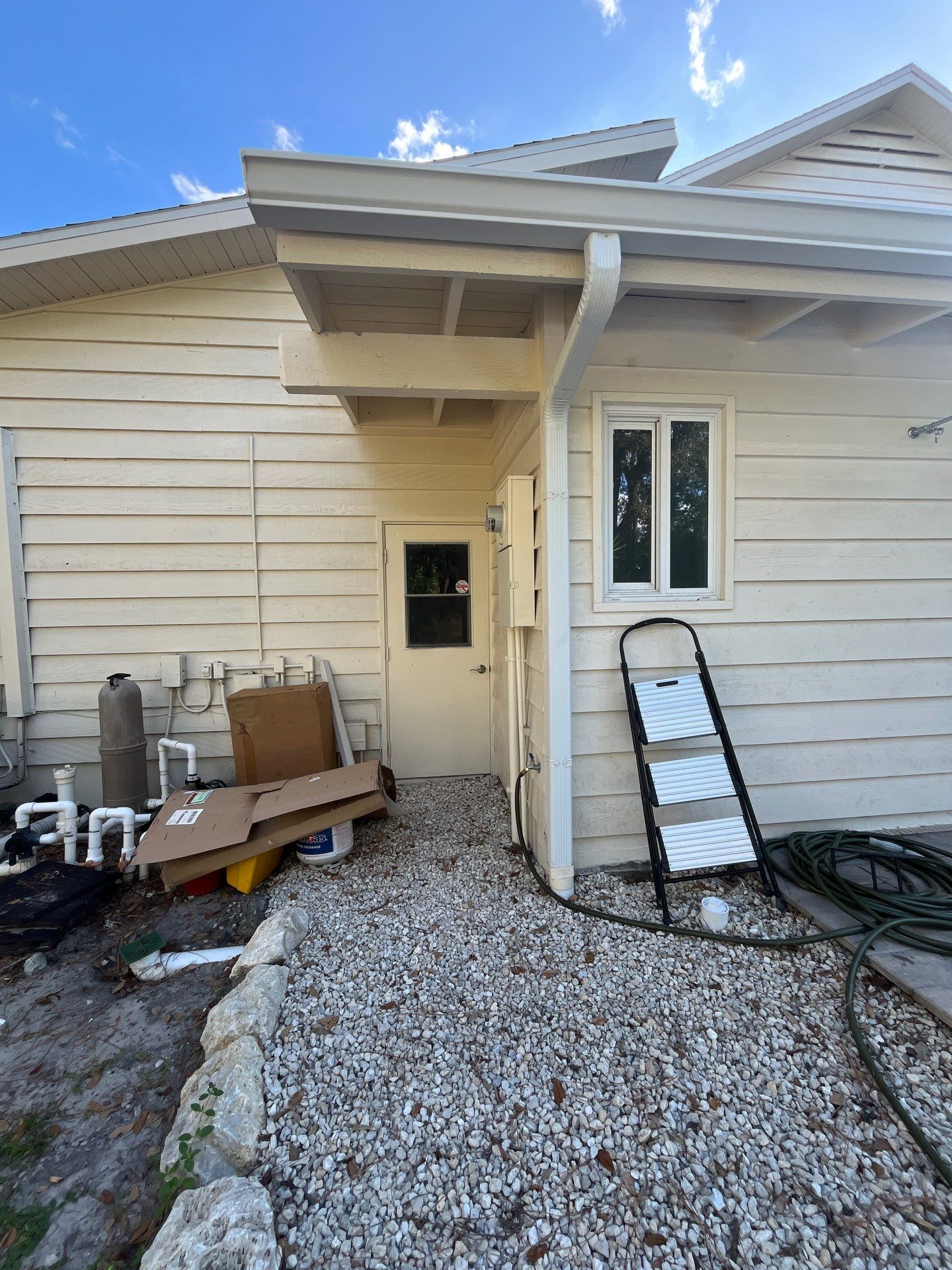 White 6-Inch Seamless Gutters Installation in Sarasota FL by Gutter Professors