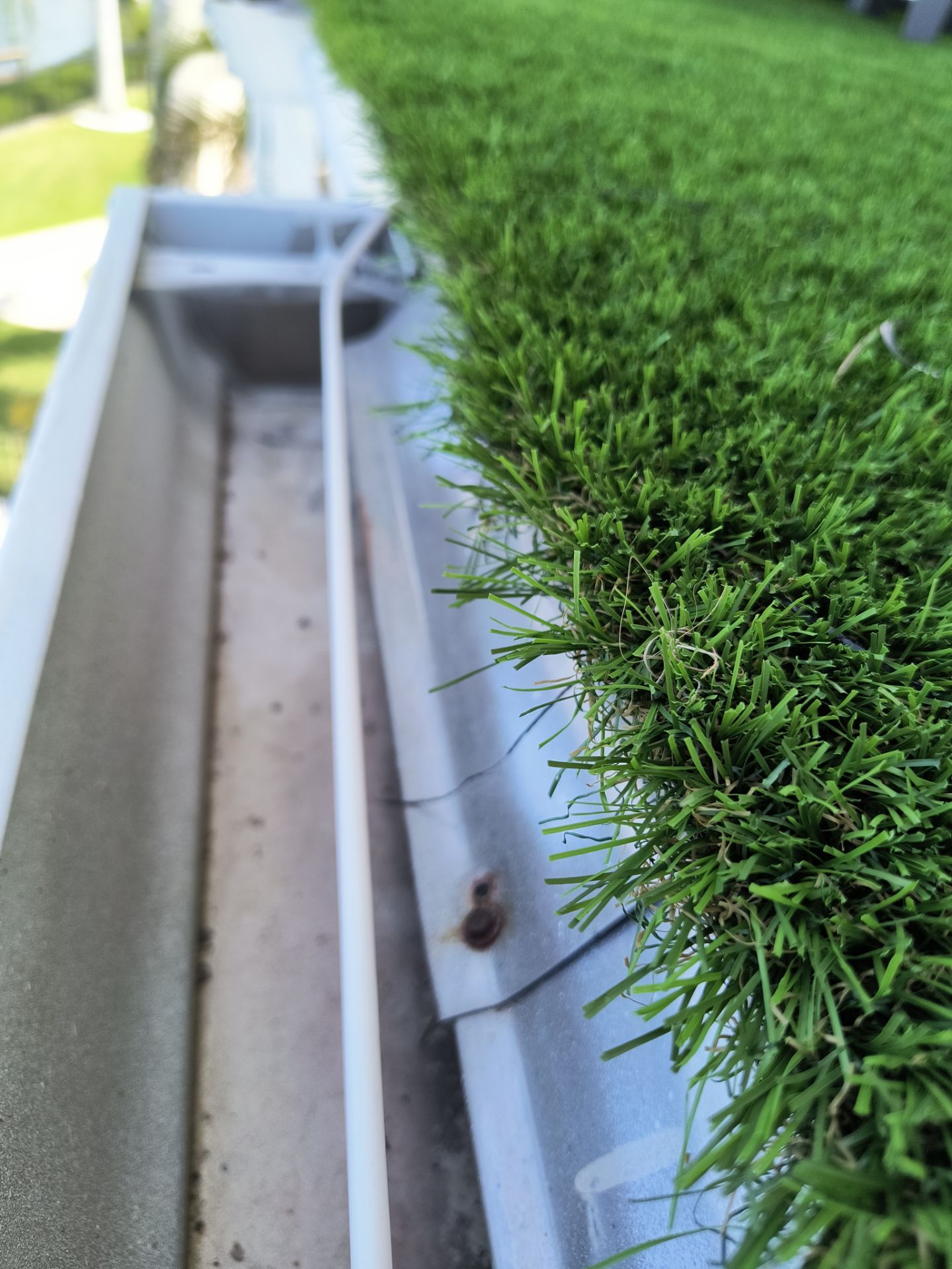 Custom Downspouts with Splash Guards in Sarasota FL by Gutter Professors