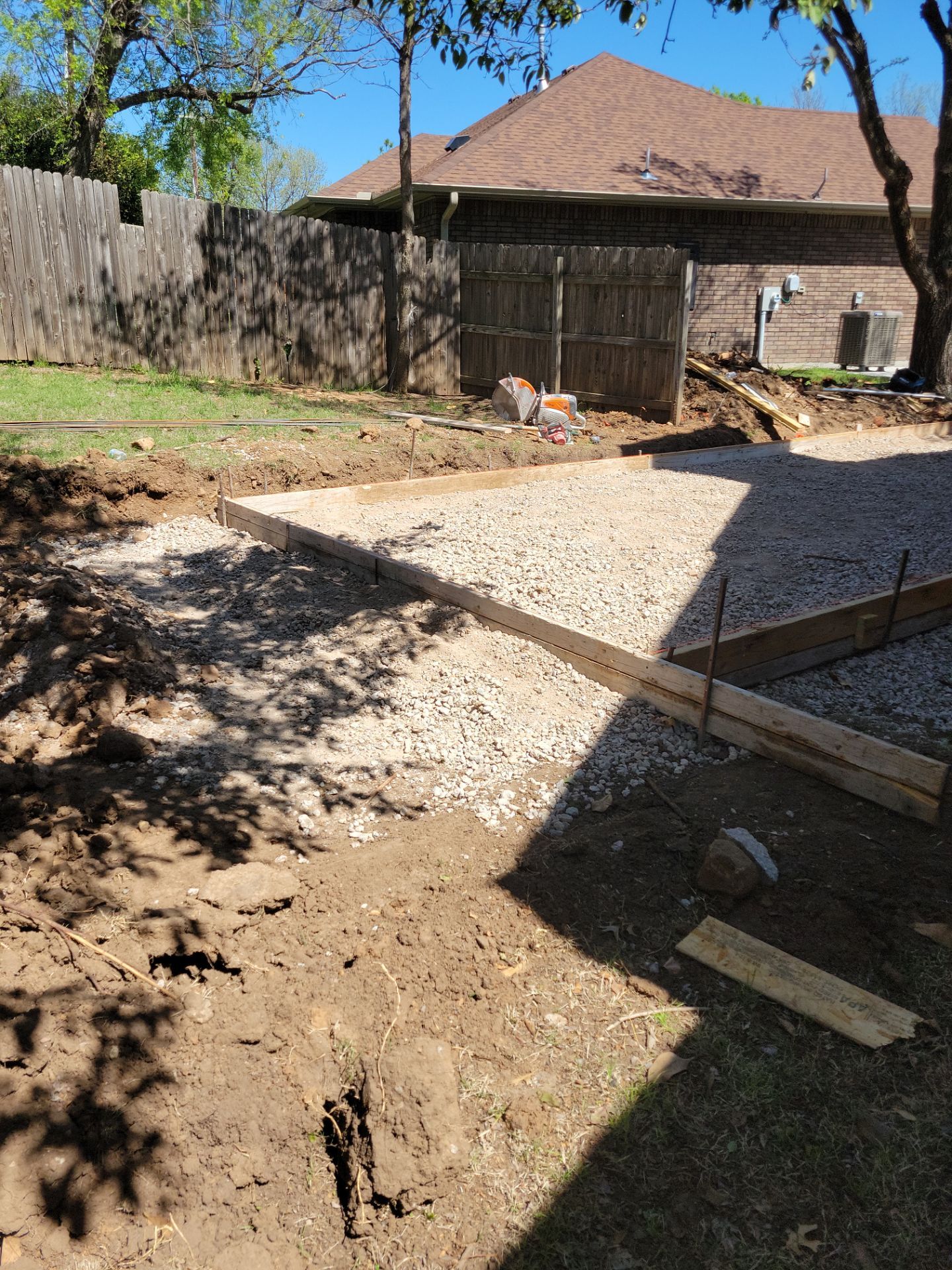Concrete Driveway and Fence by Clays Services Inc