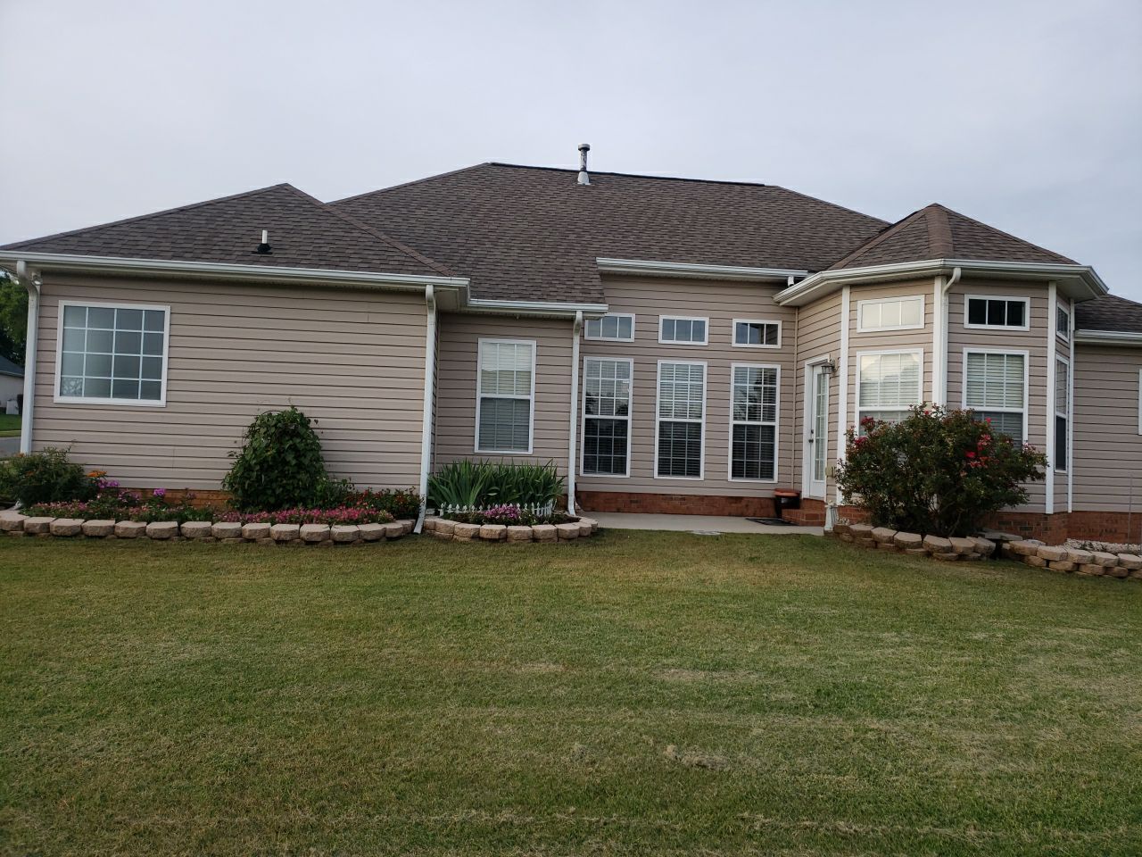 House Wash using cleaner by Power Wash Masters LLC